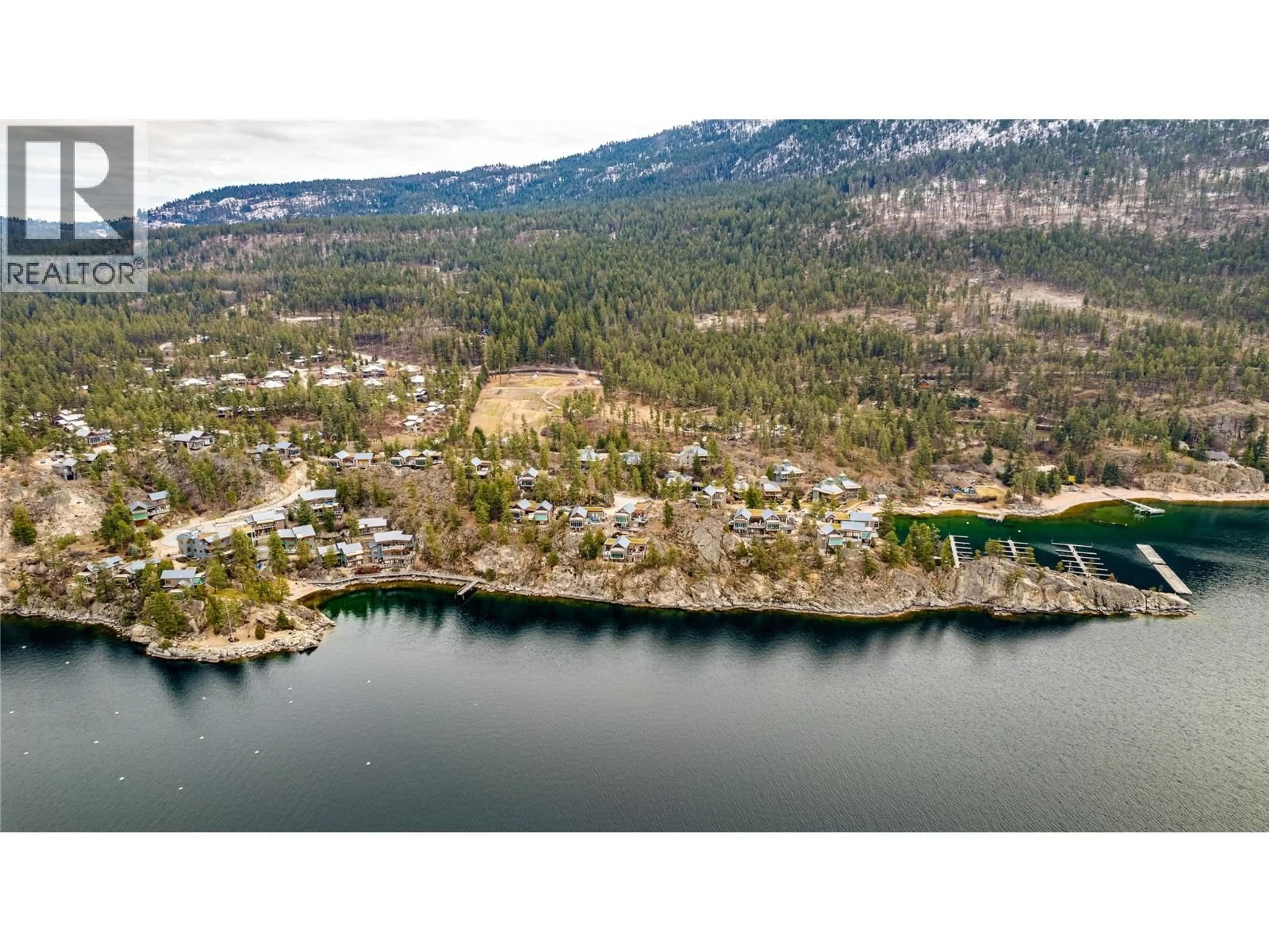 A pic from outside/outdoor area/front of a property/back of a property/a pic from drone, water/lake/river/ocean view for 92 - 9845 EASTSIDE ROAD, Vernon British Columbia V1H1Z2