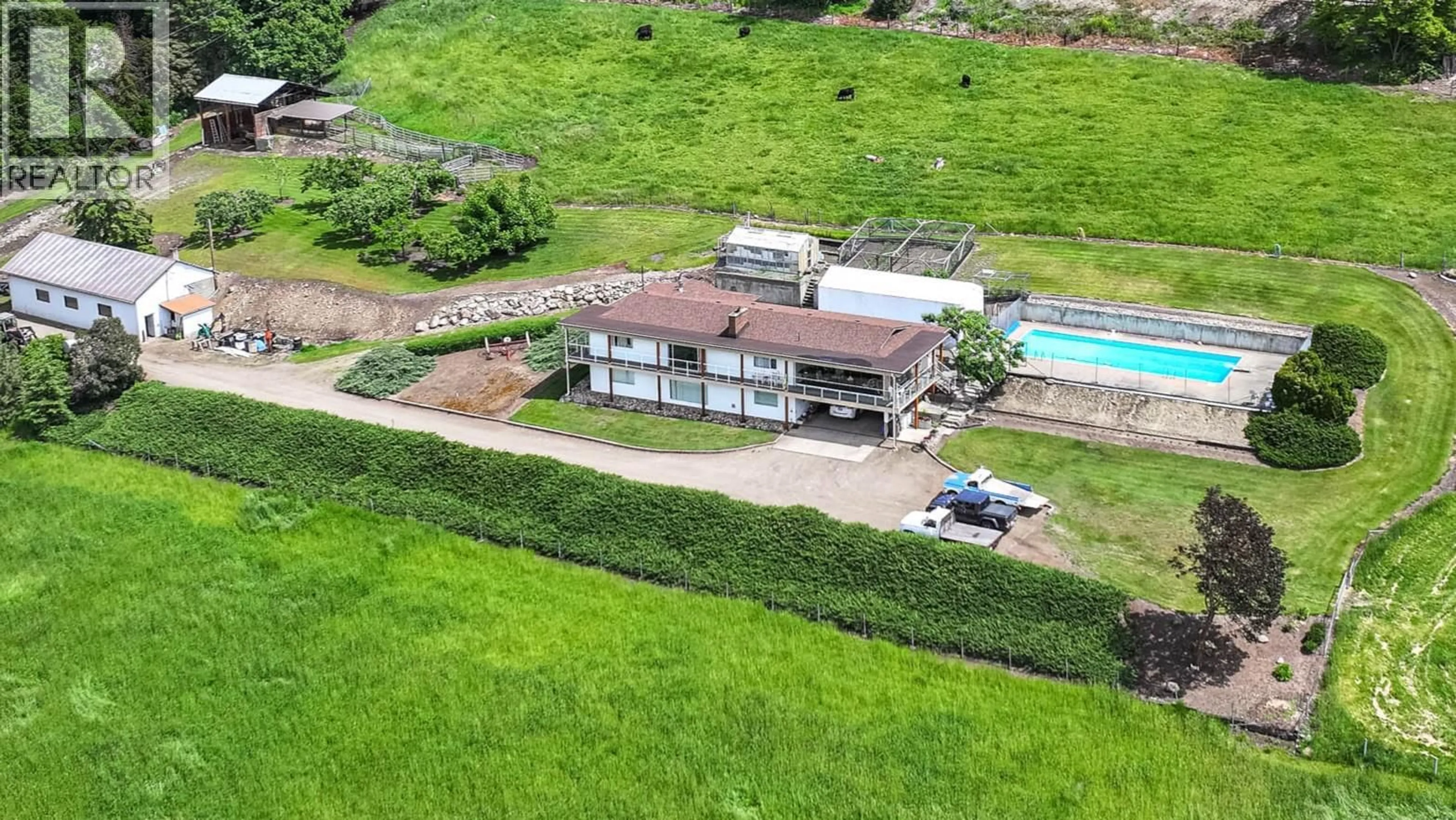 A pic from outside/outdoor area/front of a property/back of a property/a pic from drone, building for 5541 DIXON DAM ROAD, Vernon British Columbia V1B3J7