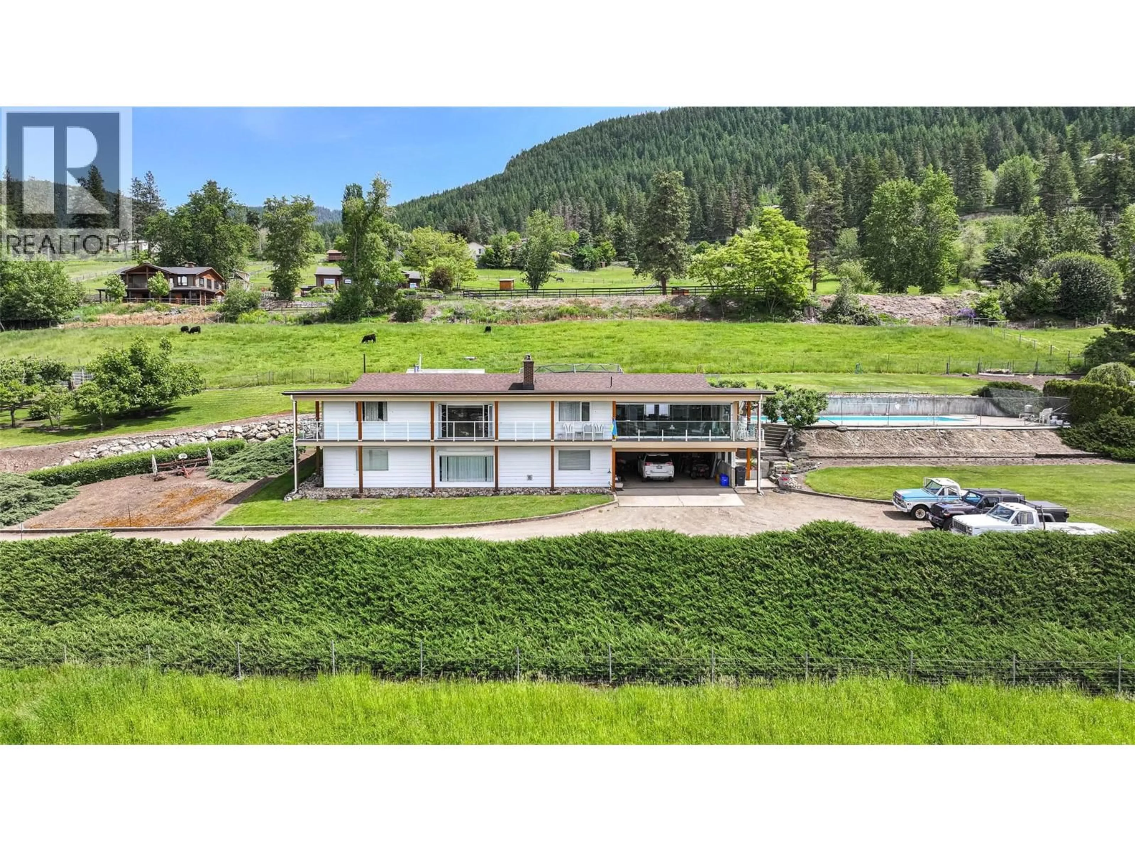 A pic from outside/outdoor area/front of a property/back of a property/a pic from drone, mountain view for 5541 DIXON DAM ROAD, Vernon British Columbia V1B3J7