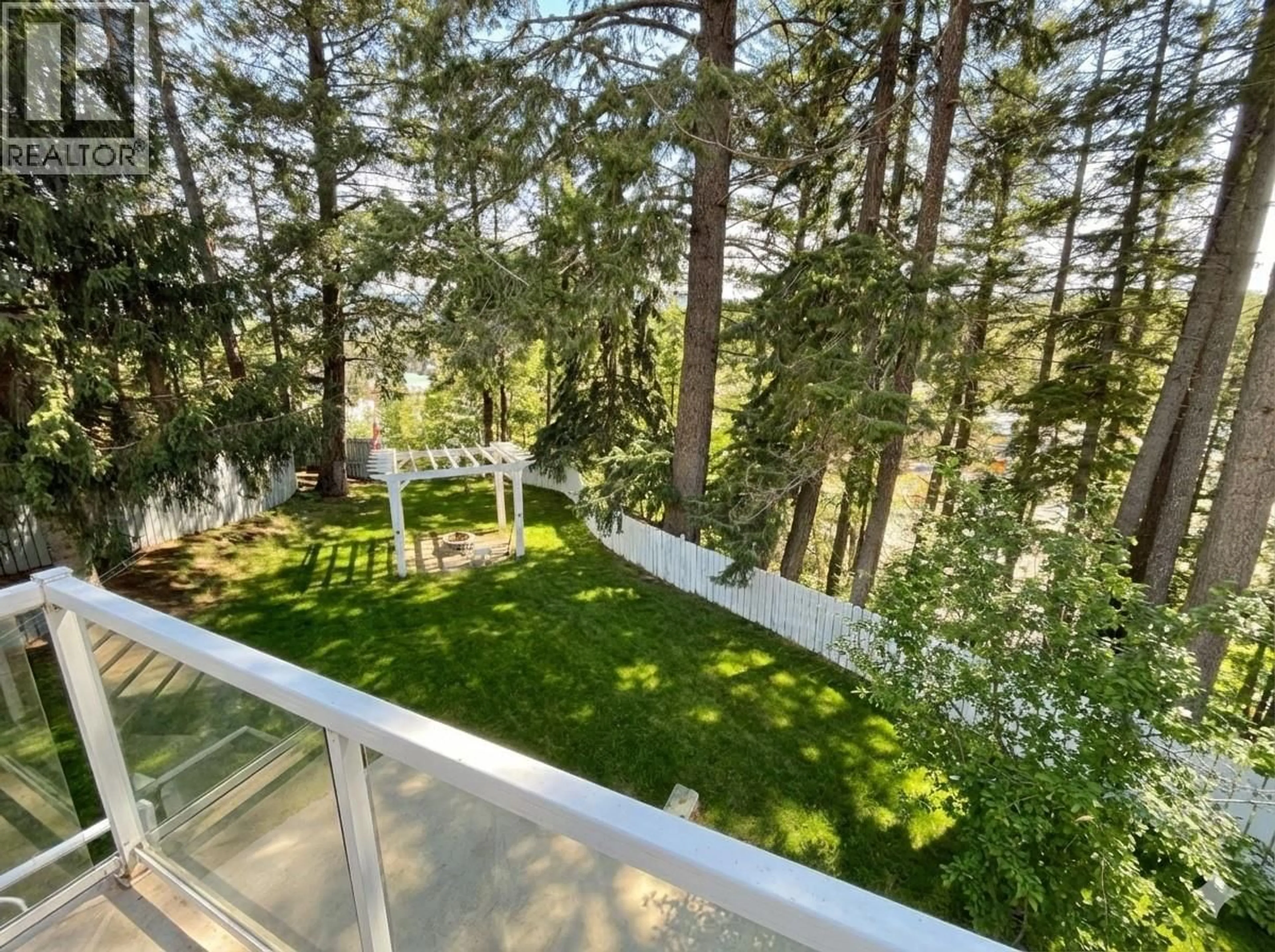 Balcony in the apartment, forest/trees view for 240 WARREN STREET, Princeton British Columbia V0X1W0