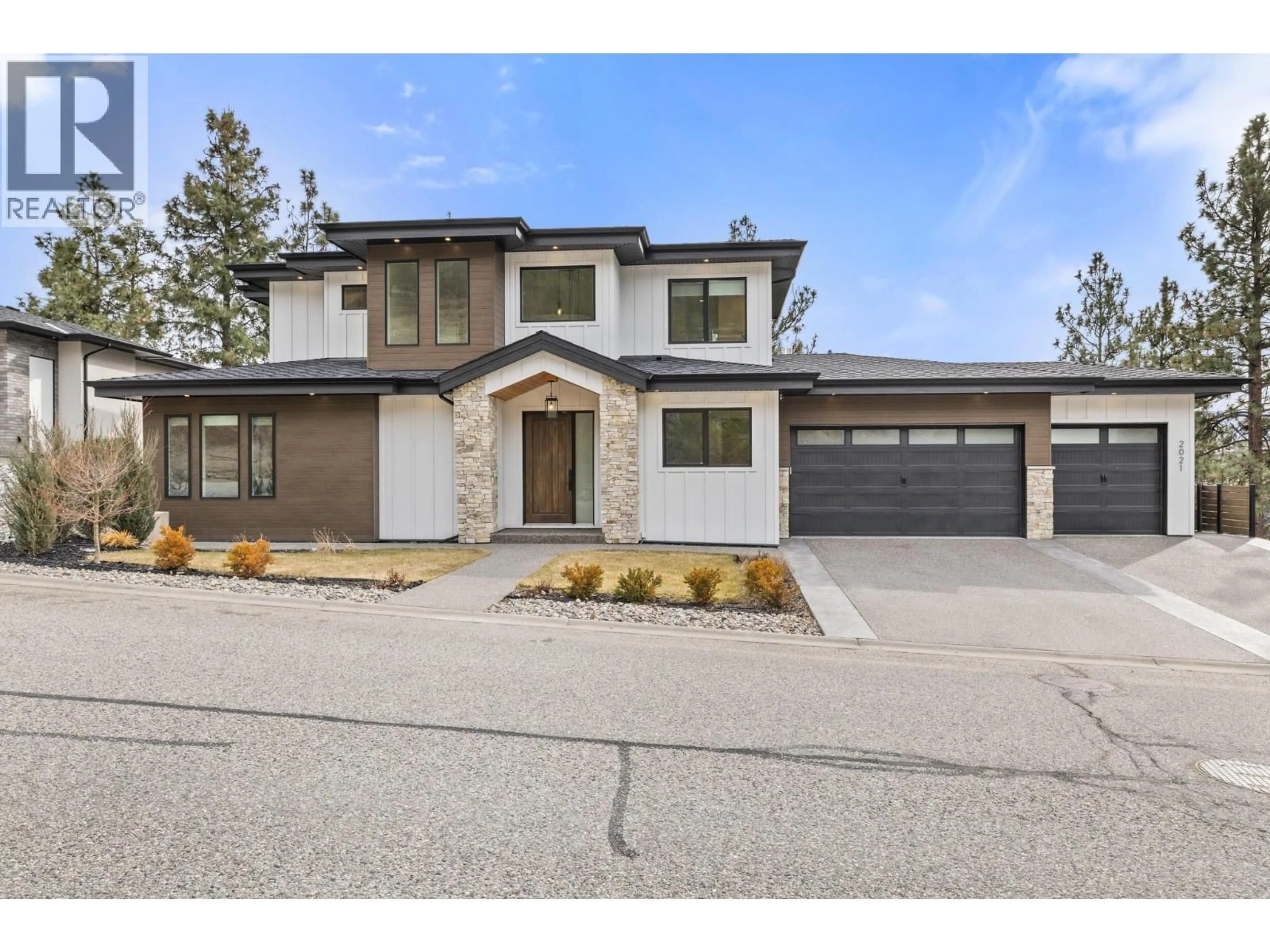 Home with brick exterior material, street for 2021 SPYGLASS WAY, West Kelowna British Columbia V1Z4B6
