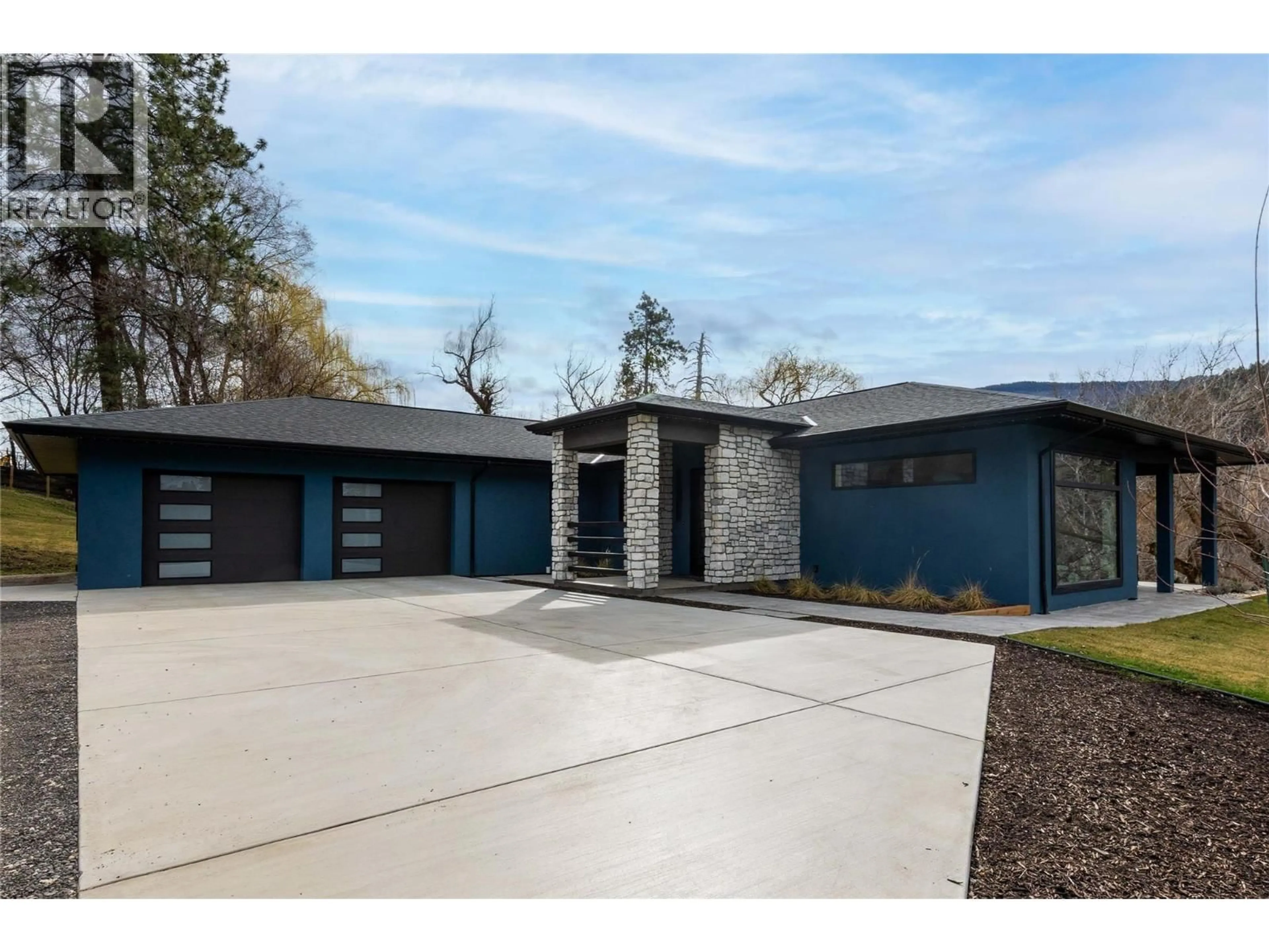 Home with brick exterior material, street for 10202 KALAMALKA ROAD, Coldstream British Columbia V1B1L7