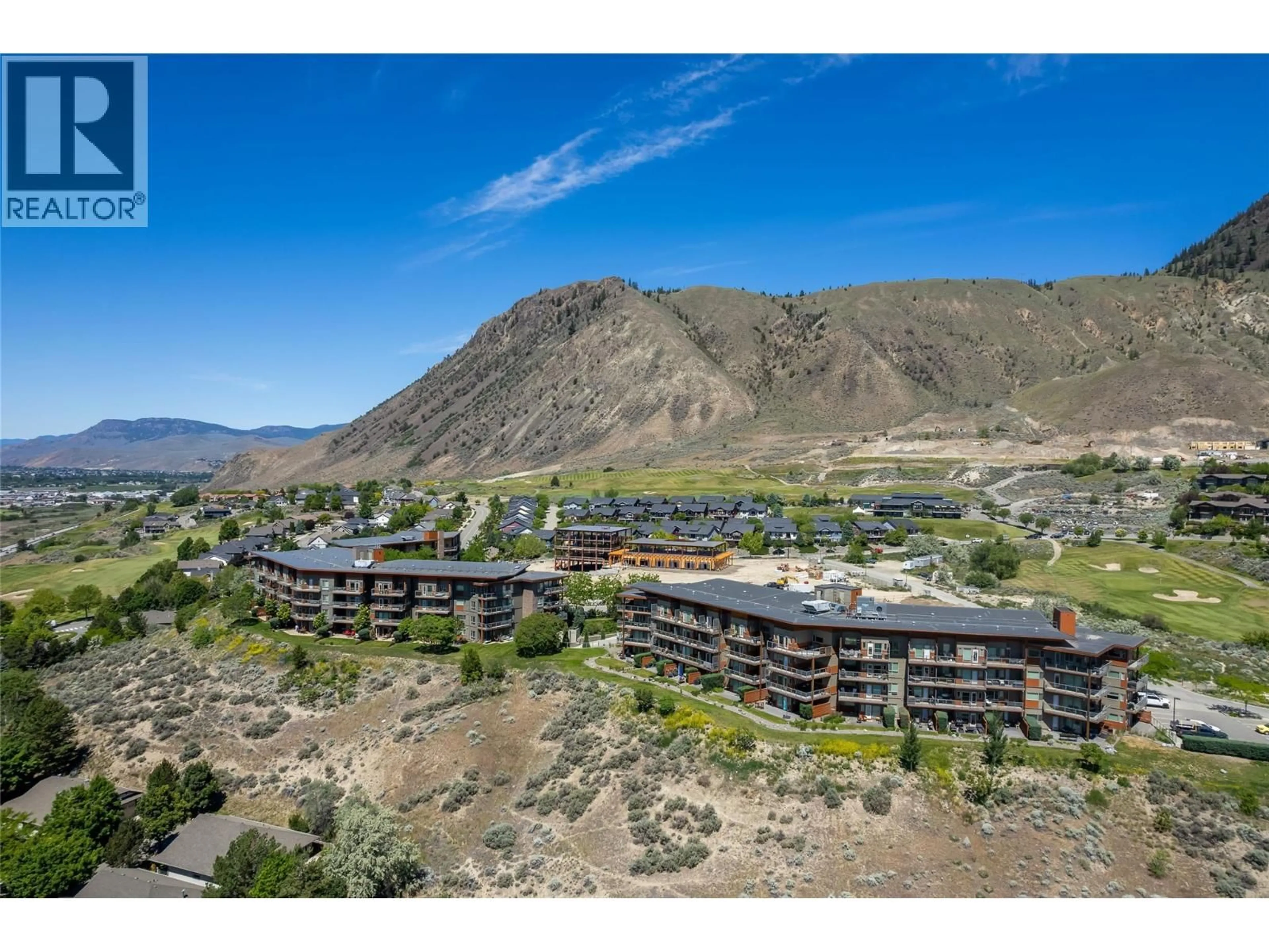 A pic from outside/outdoor area/front of a property/back of a property/a pic from drone, mountain view for 2410 - 1030 TALASA WAY, Kamloops British Columbia V2H0C3