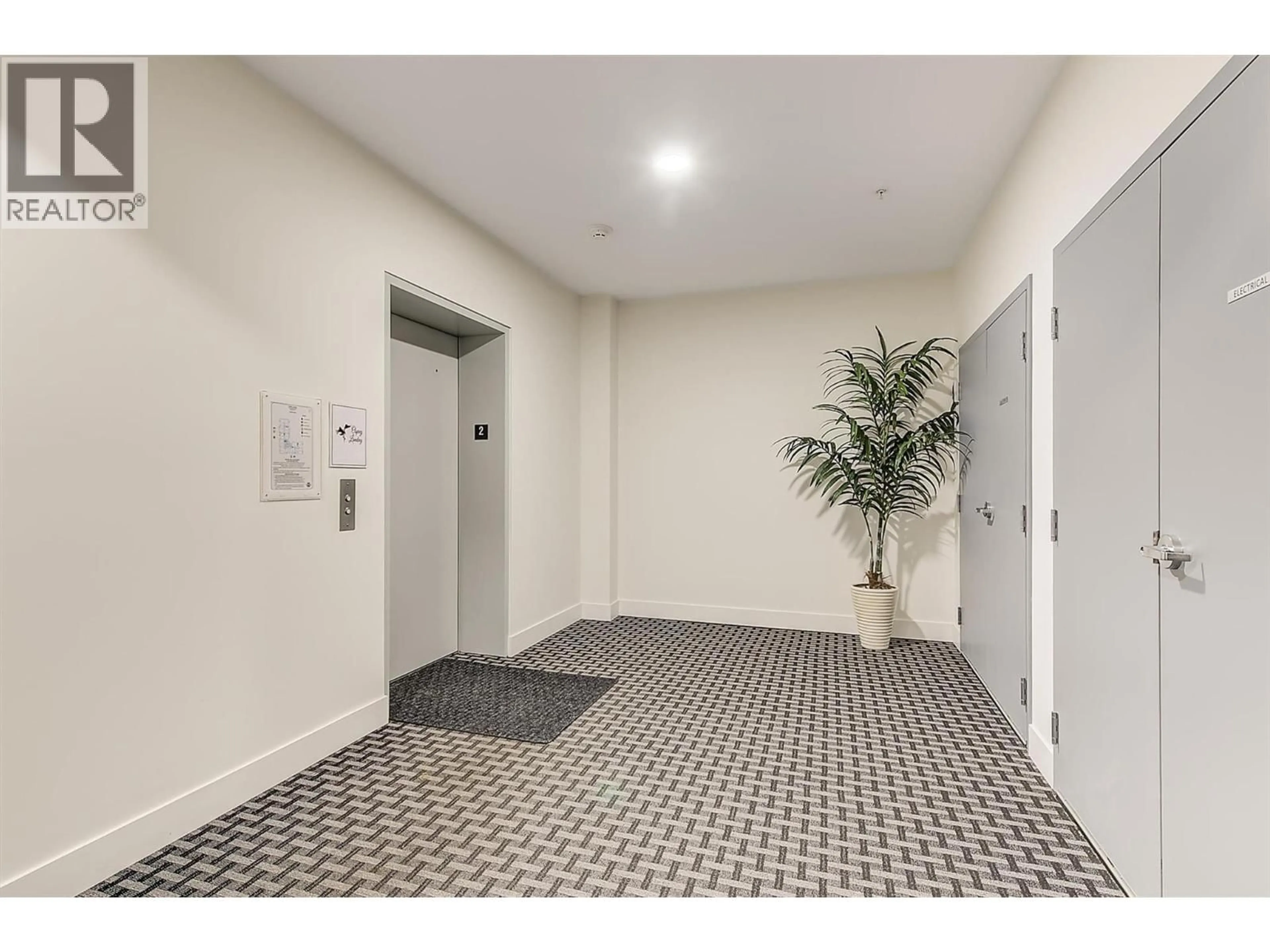 Indoor foyer for 201 - 3090 BURTCH ROAD, Kelowna British Columbia V1W5G9
