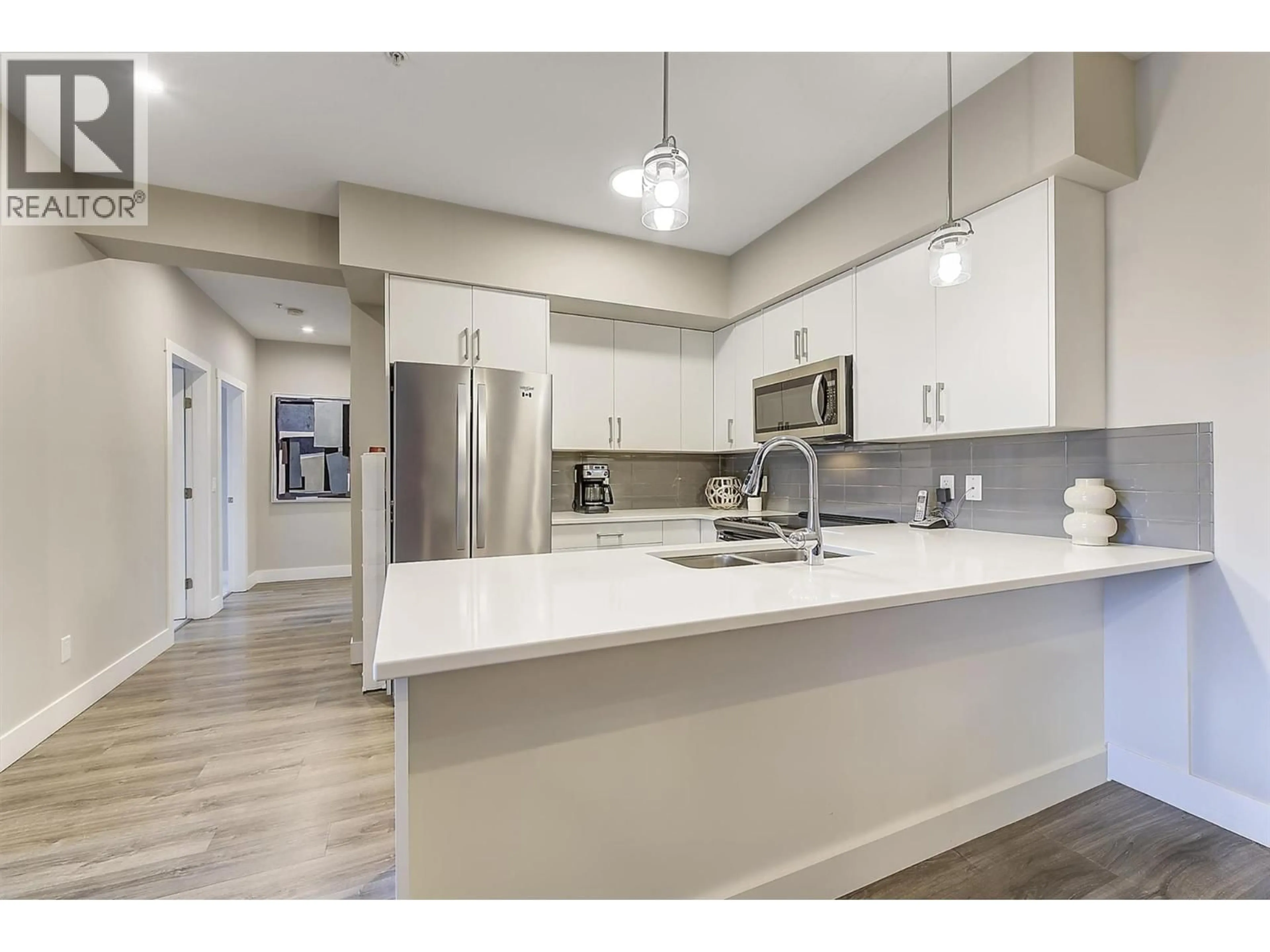 Open concept kitchen, unknown for 201 - 3090 BURTCH ROAD, Kelowna British Columbia V1W5G9