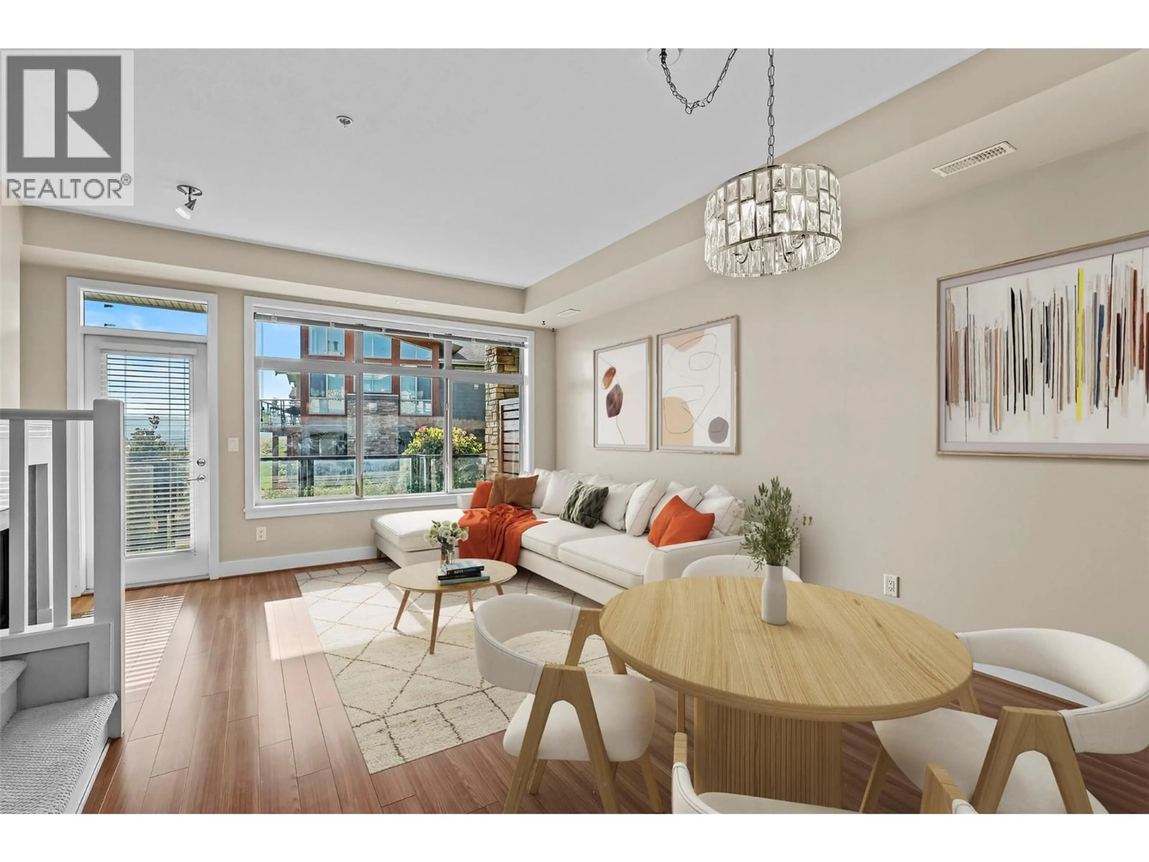 Living room with furniture, wood/laminate floor for 31 - 130 COLEBROOK ROAD, Kamloops British Columbia V1S0B4