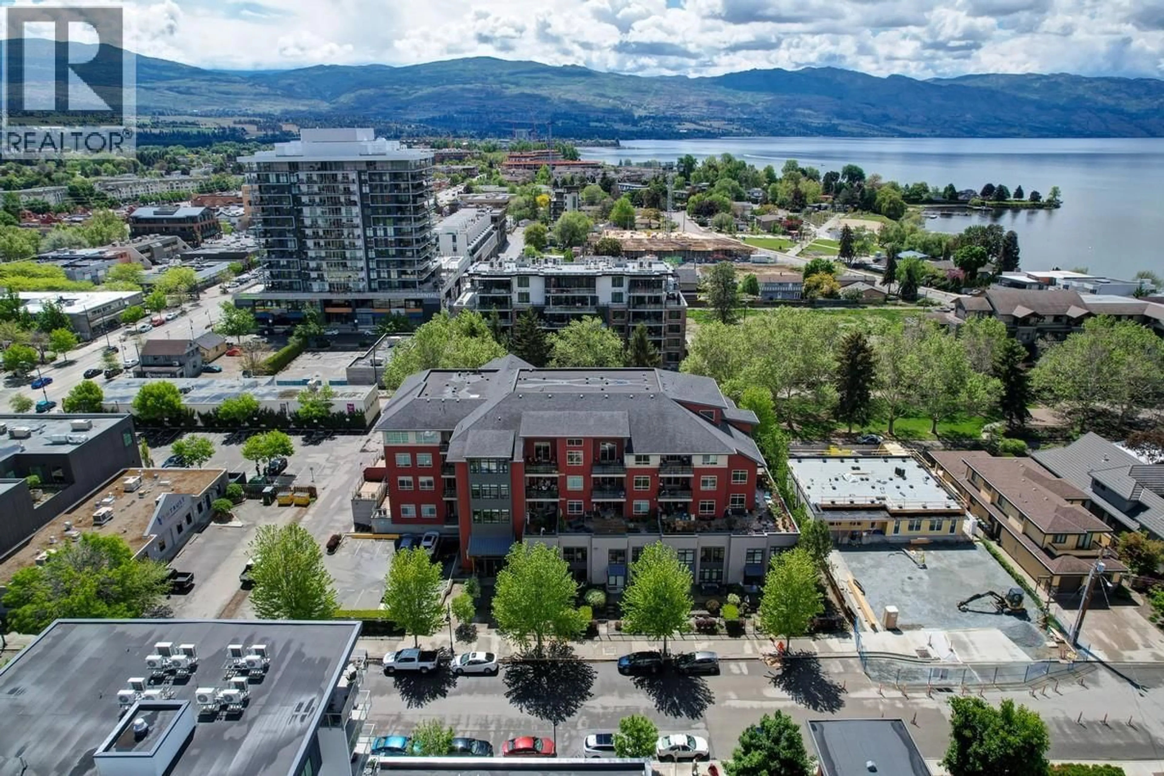 A pic from outside/outdoor area/front of a property/back of a property/a pic from drone, water/lake/river/ocean view for 111 - 457 WEST AVENUE, Kelowna British Columbia V1Y4Z3