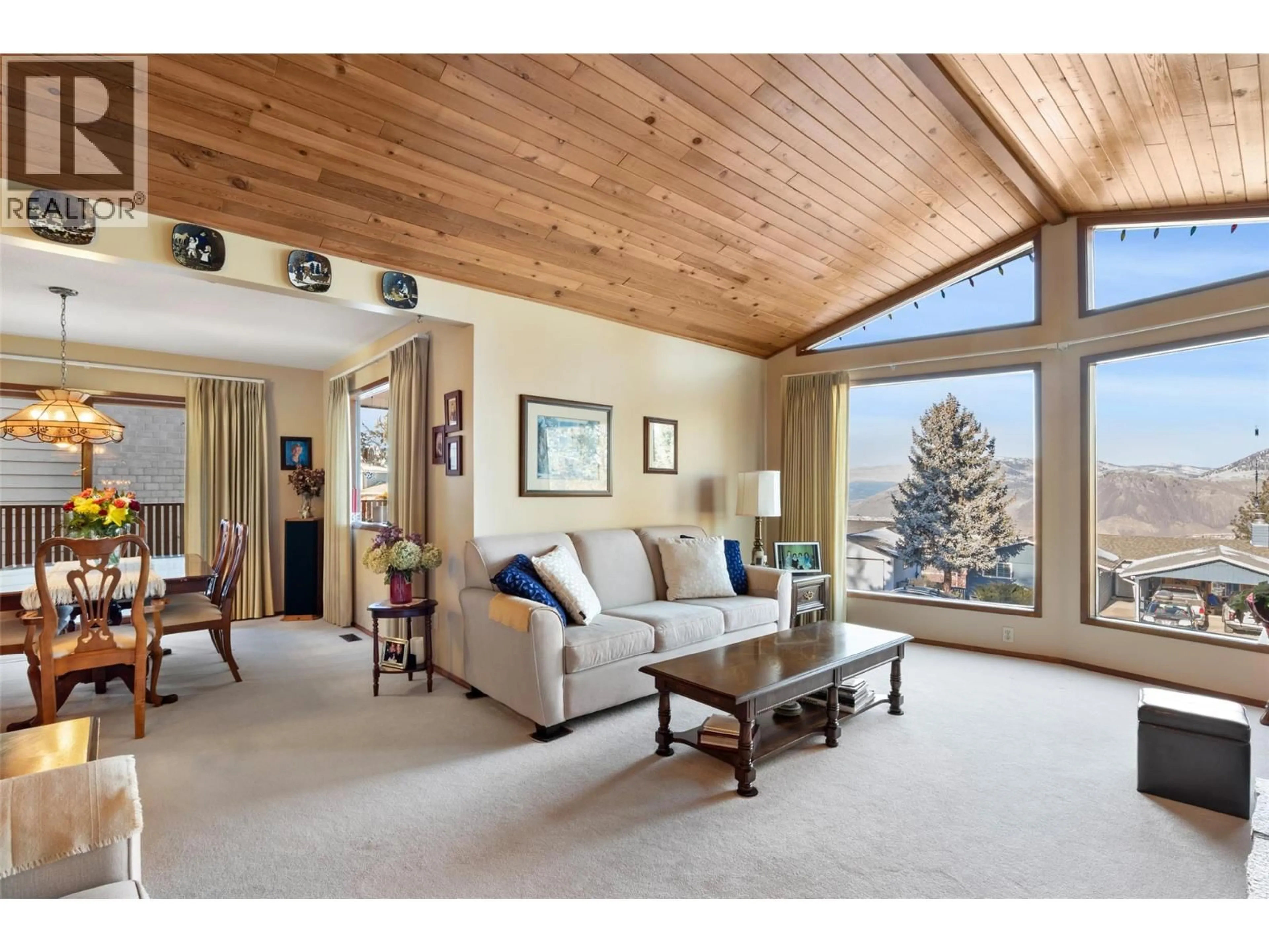 Living room with furniture, wood/laminate floor for 235 ROBSON DRIVE, Kamloops British Columbia V2E1W2