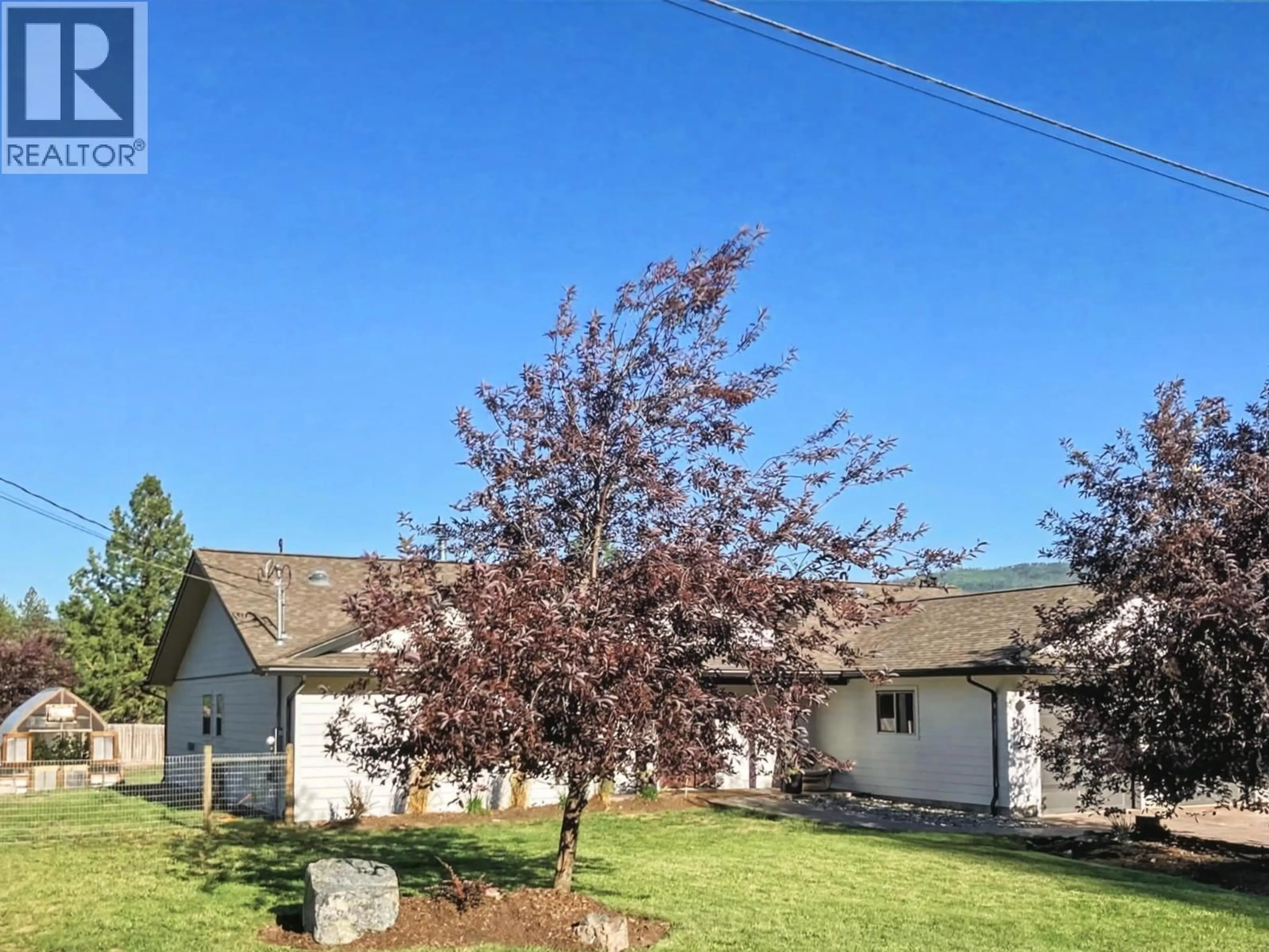 A pic from outside/outdoor area/front of a property/back of a property/a pic from drone, street for 8170 PLOTNIKOFF ROAD, Grand Forks British Columbia V0H1H2