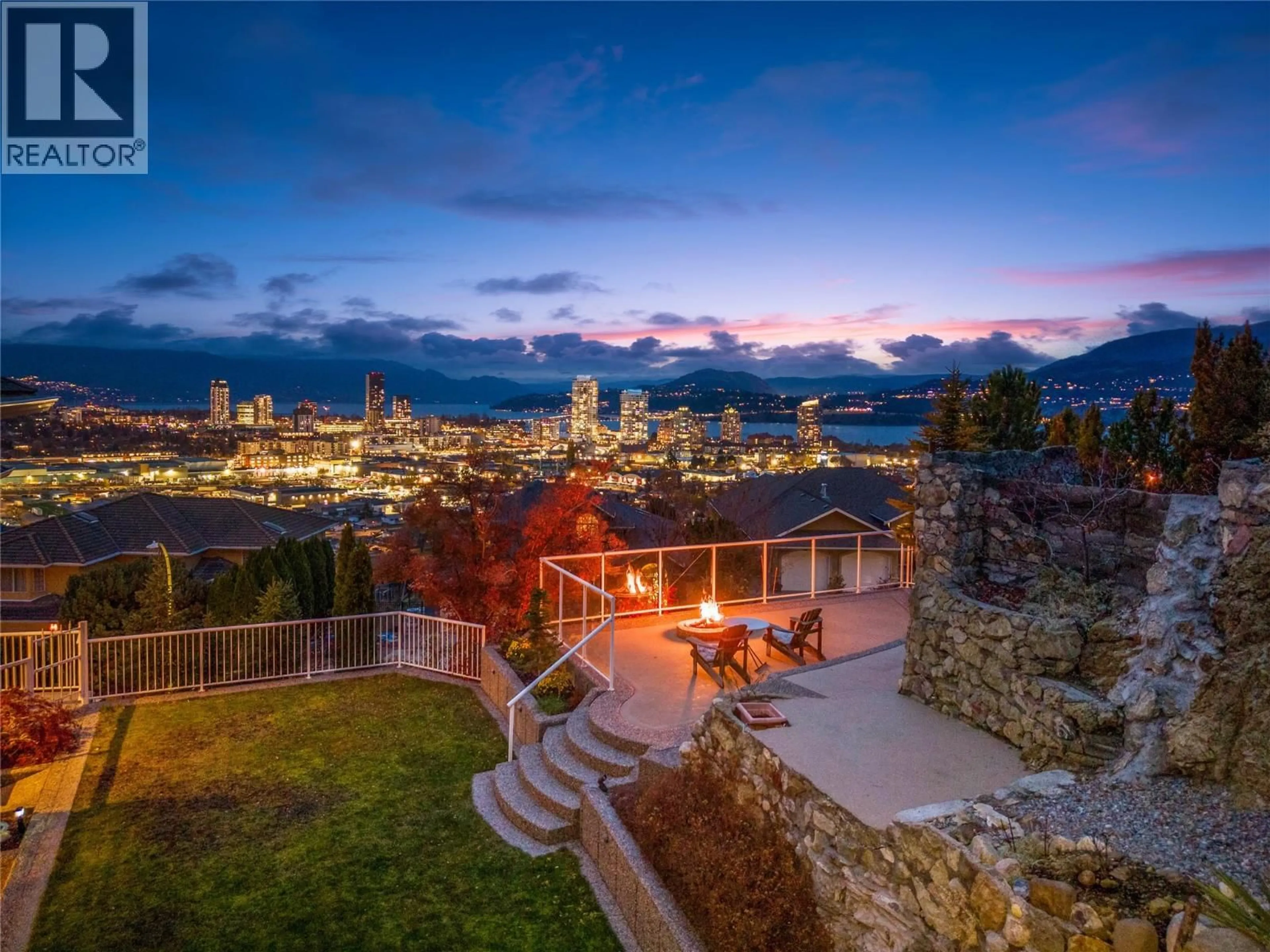 A pic from outside/outdoor area/front of a property/back of a property/a pic from drone, mountain view for 705 ROYAL PINE DRIVE, Kelowna British Columbia V1Y9G2
