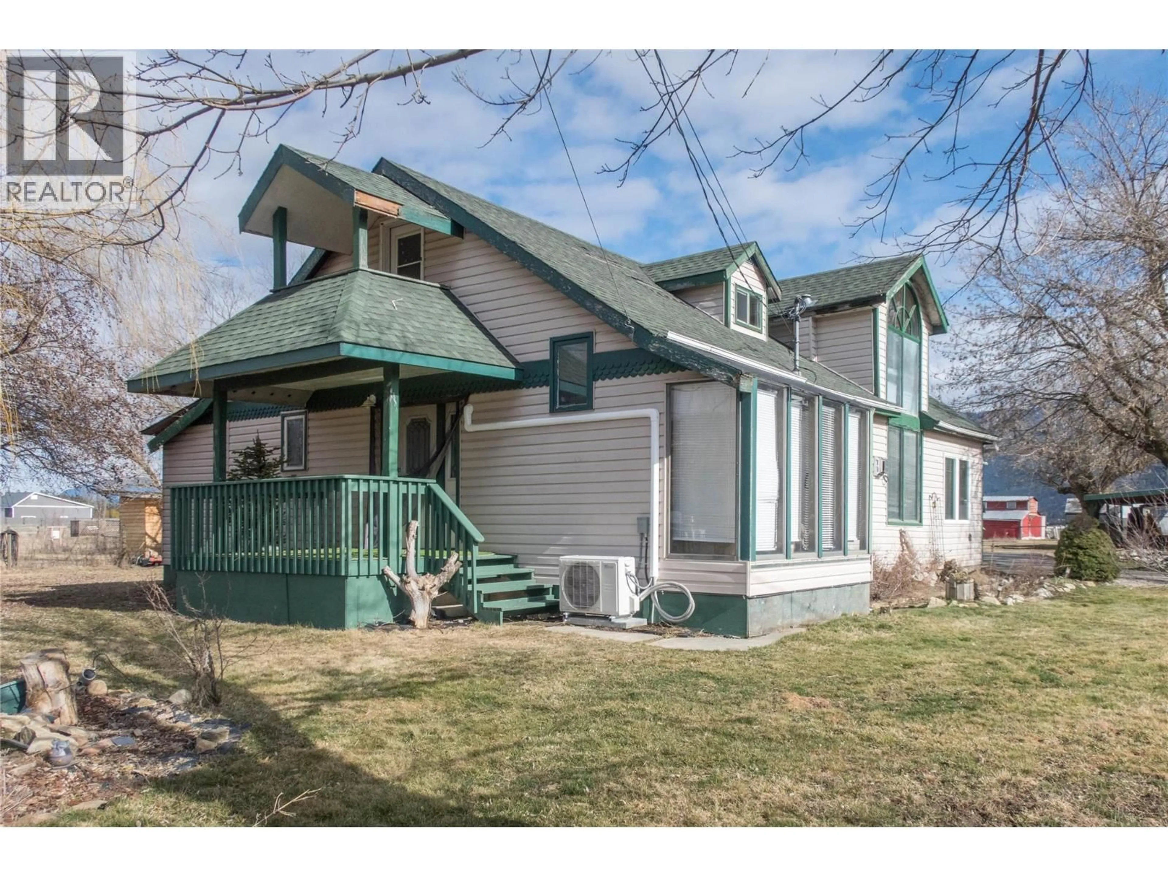 Home with vinyl exterior material, street for 1978 PLEASANT VALLEY ROAD, Spallumcheen British Columbia V4Y0T7