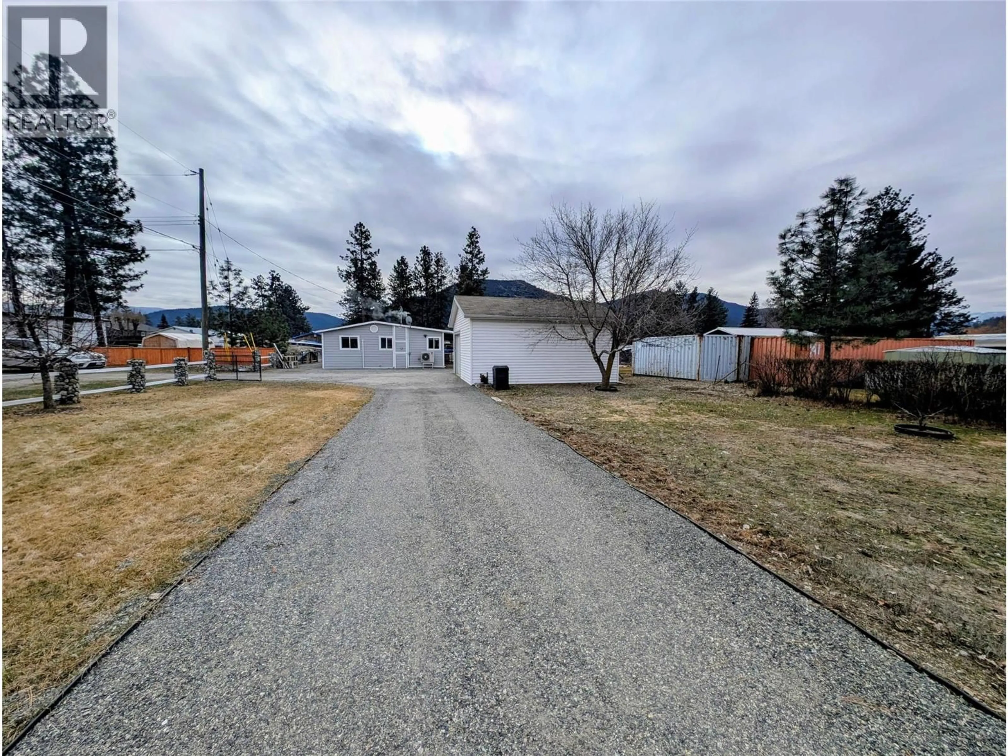 A pic from outside/outdoor area/front of a property/back of a property/a pic from drone, street for 448 DODDING AVENUE, Merritt British Columbia V0K1Y0