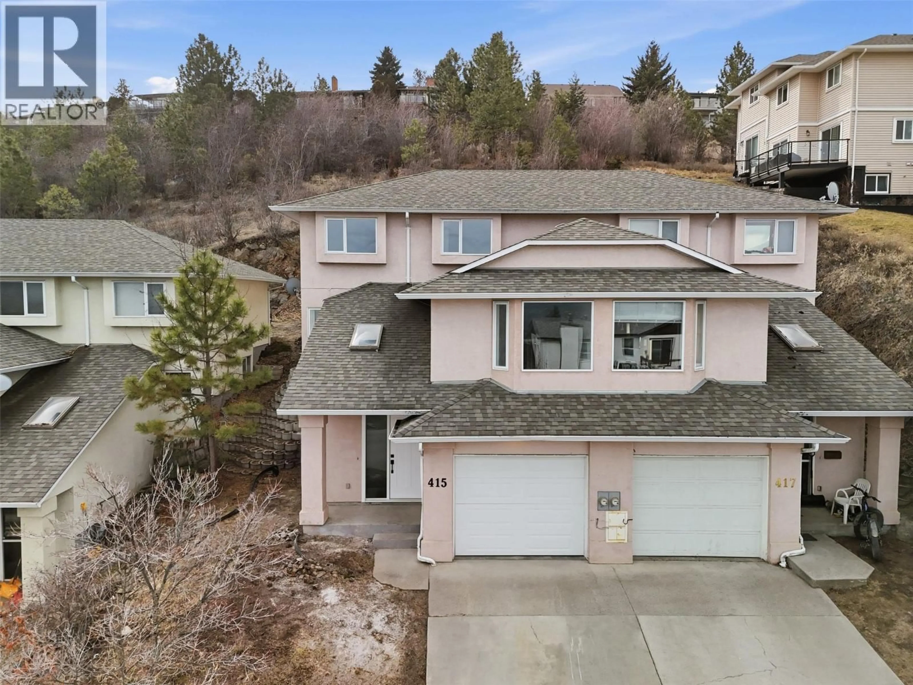A pic from outside/outdoor area/front of a property/back of a property/a pic from drone, mountain view for 415 WADDINGTON DRIVE, Kamloops British Columbia V2E1S3