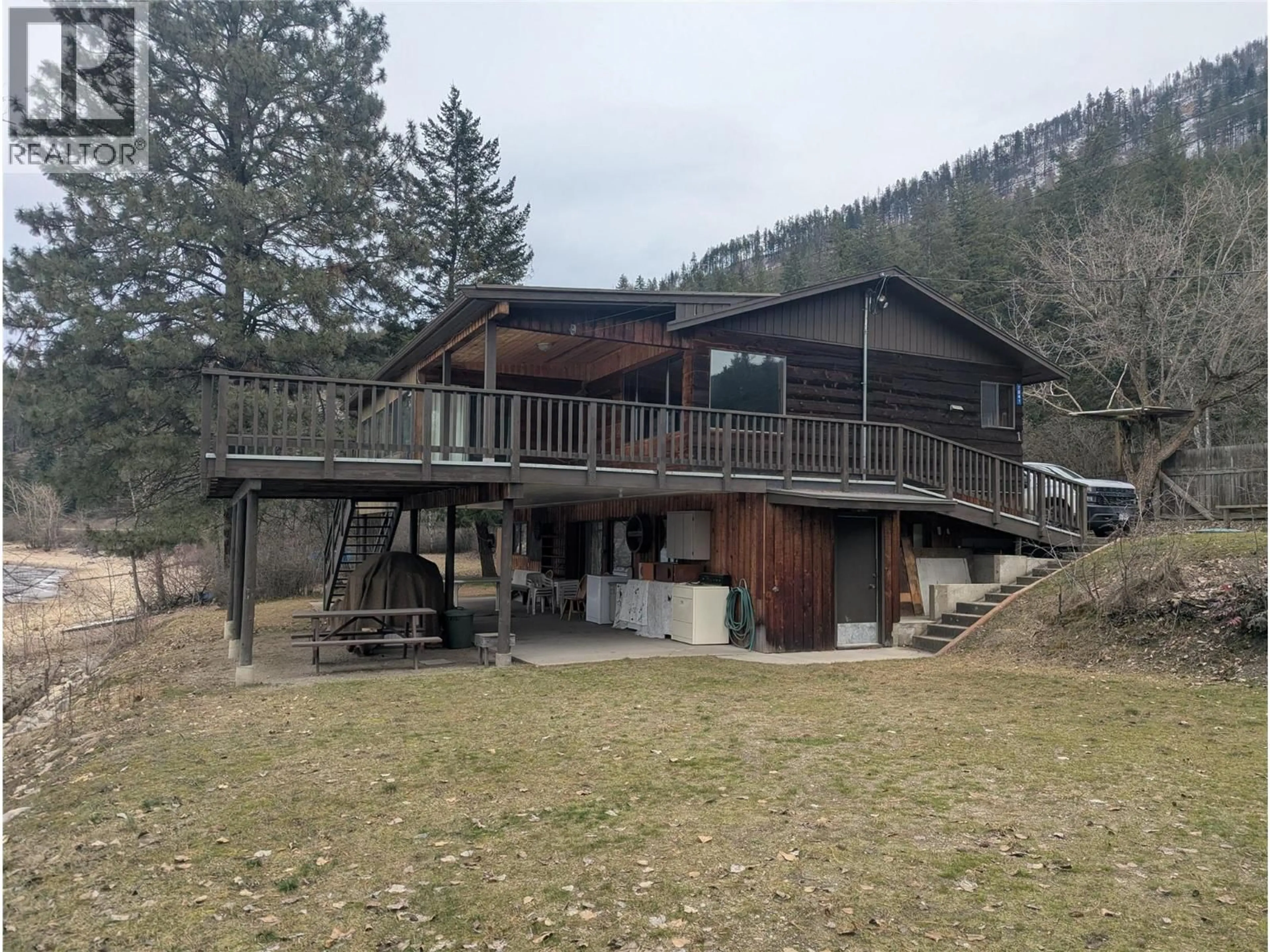 A pic from outside/outdoor area/front of a property/back of a property/a pic from drone, mountain view for 7841 FRONTAGE LANE, Chase British Columbia V0E1M1