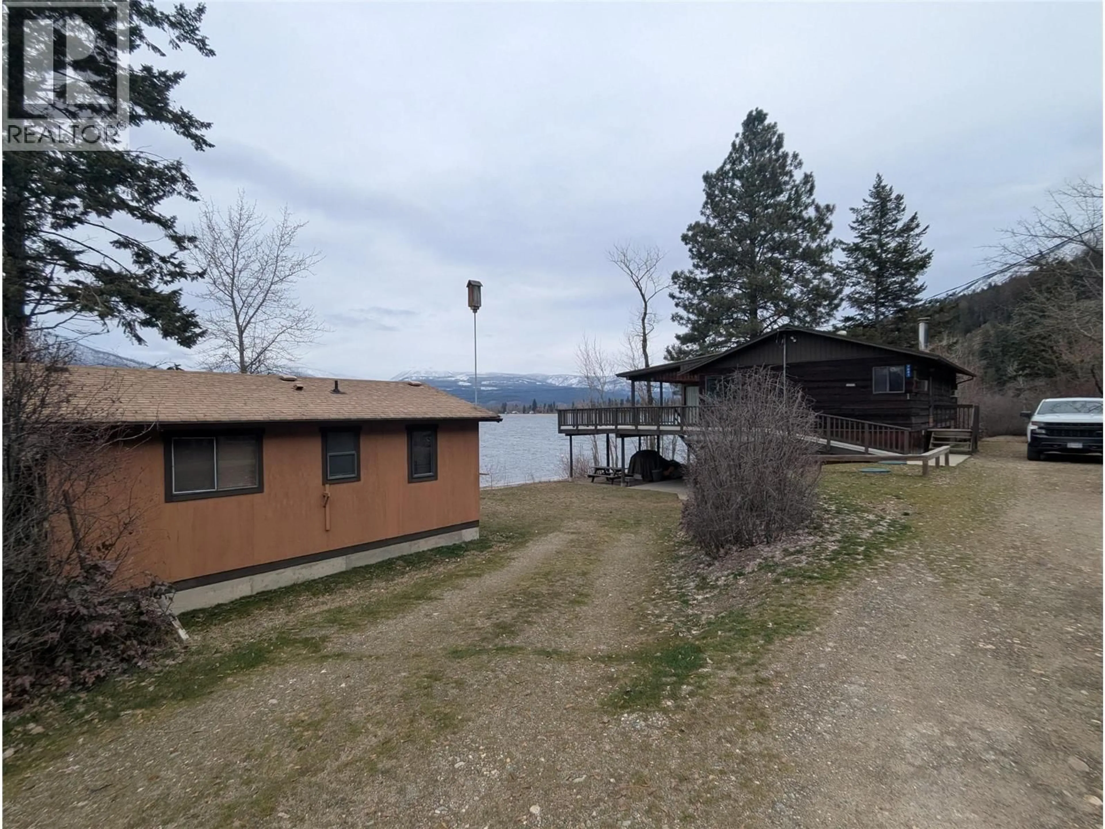 A pic from outside/outdoor area/front of a property/back of a property/a pic from drone, water/lake/river/ocean view for 7841 FRONTAGE LANE, Chase British Columbia V0E1M1