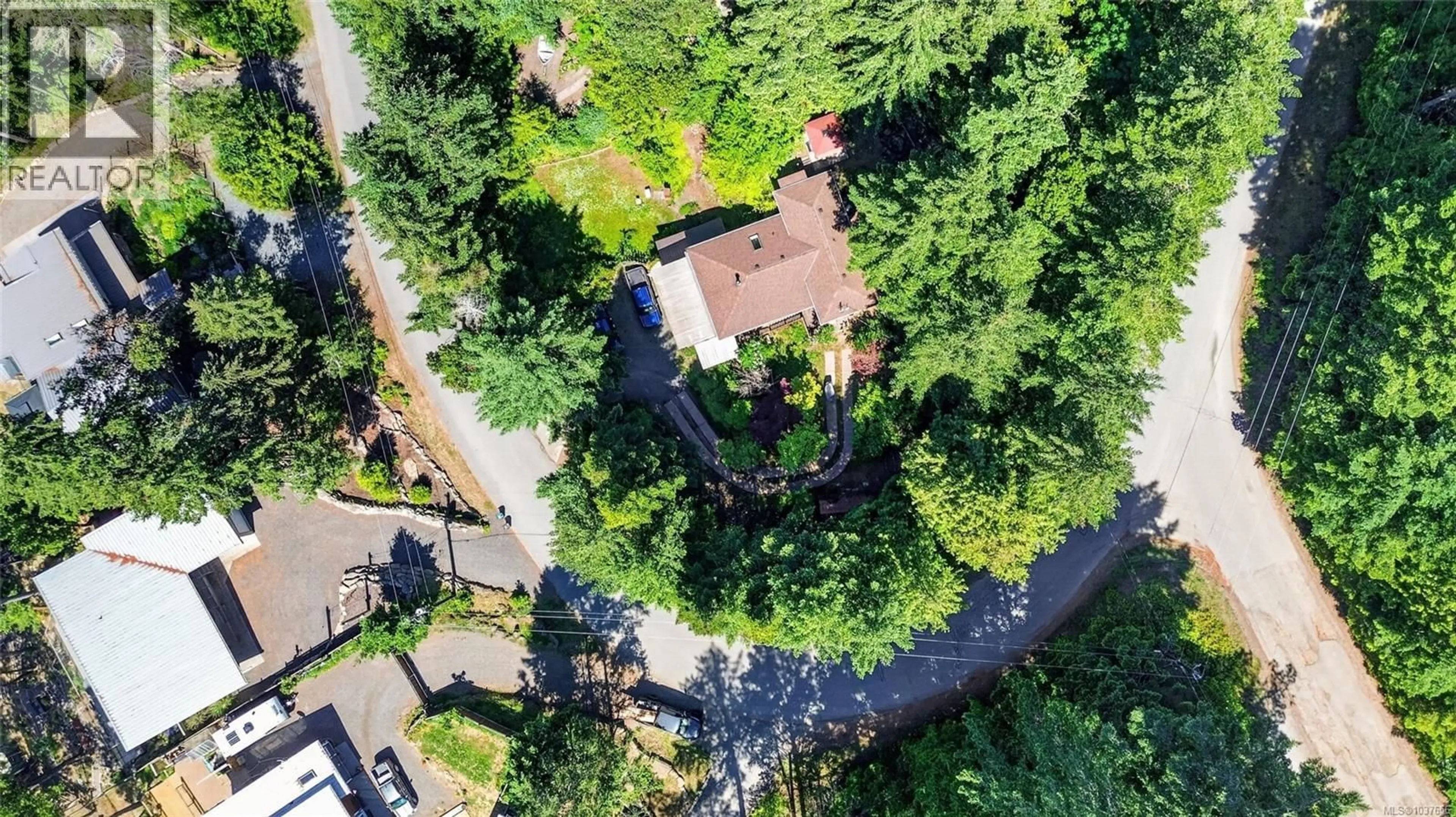 A pic from outside/outdoor area/front of a property/back of a property/a pic from drone, forest/trees view for 1311 HARRISON WAY, Gabriola Island British Columbia V0R1X2