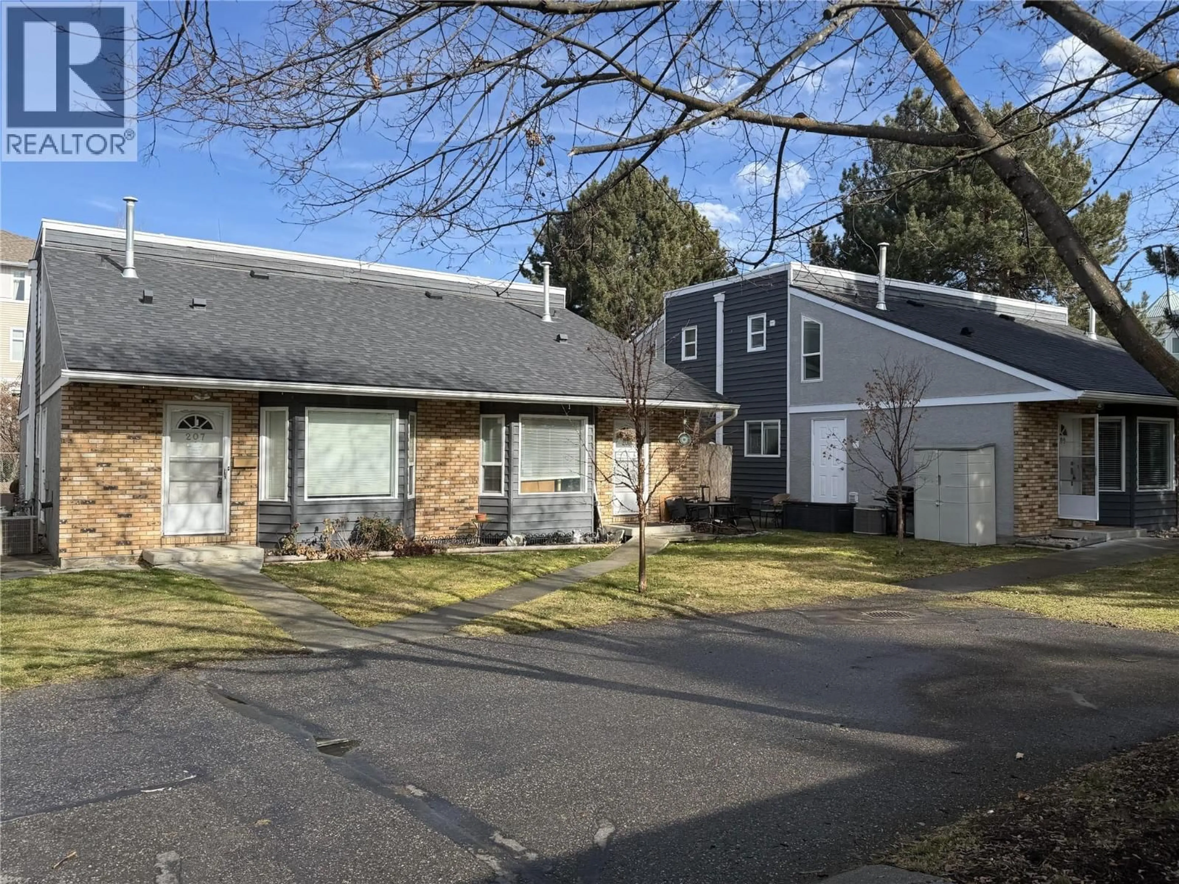 A pic from outside/outdoor area/front of a property/back of a property/a pic from drone, street for 207 - 3155 GORDON DRIVE, Kelowna British Columbia V1W3N5