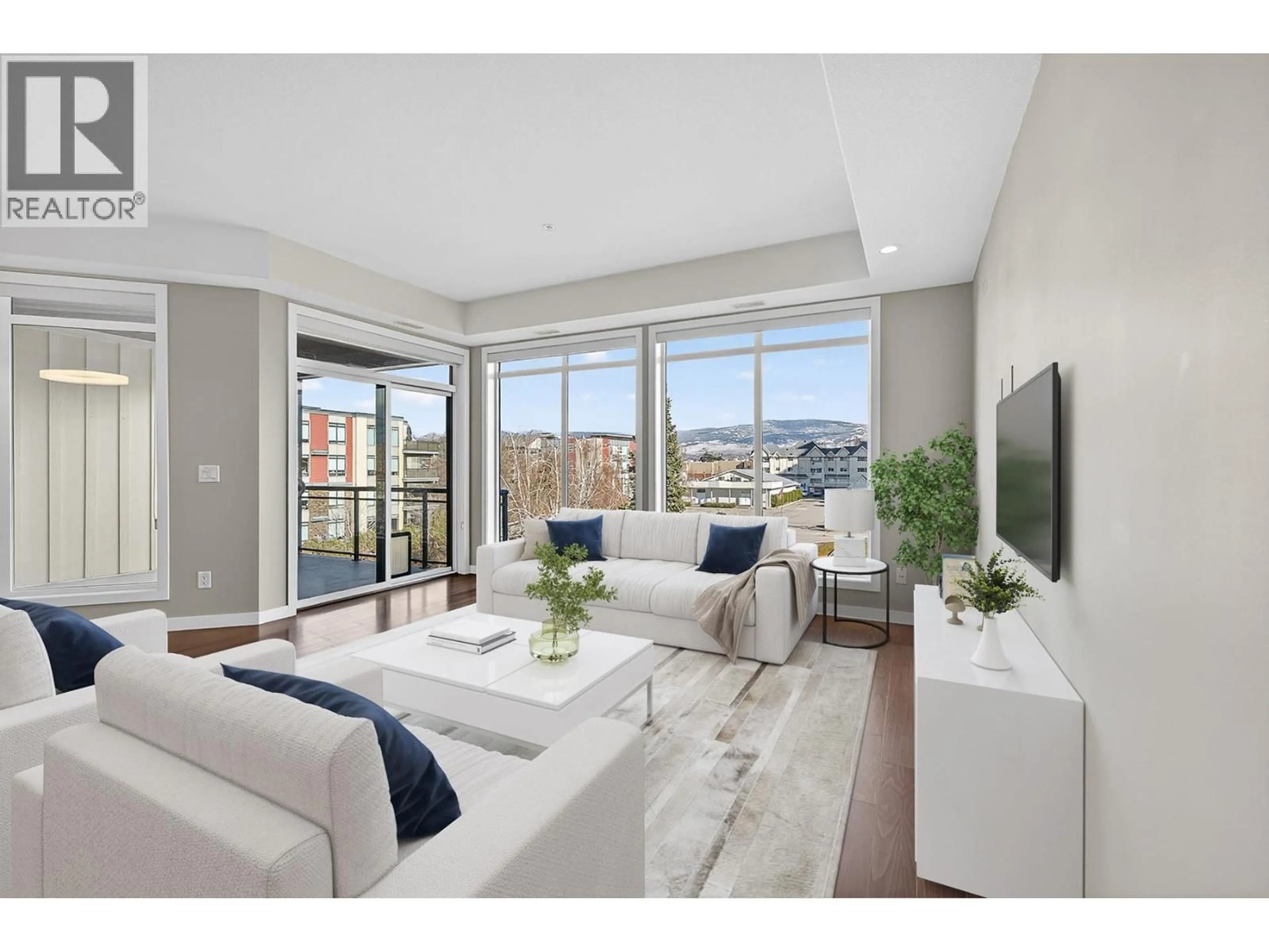 Living room with furniture, unknown for 306 - 1933 AMBROSI ROAD, Kelowna British Columbia V1Y4S1