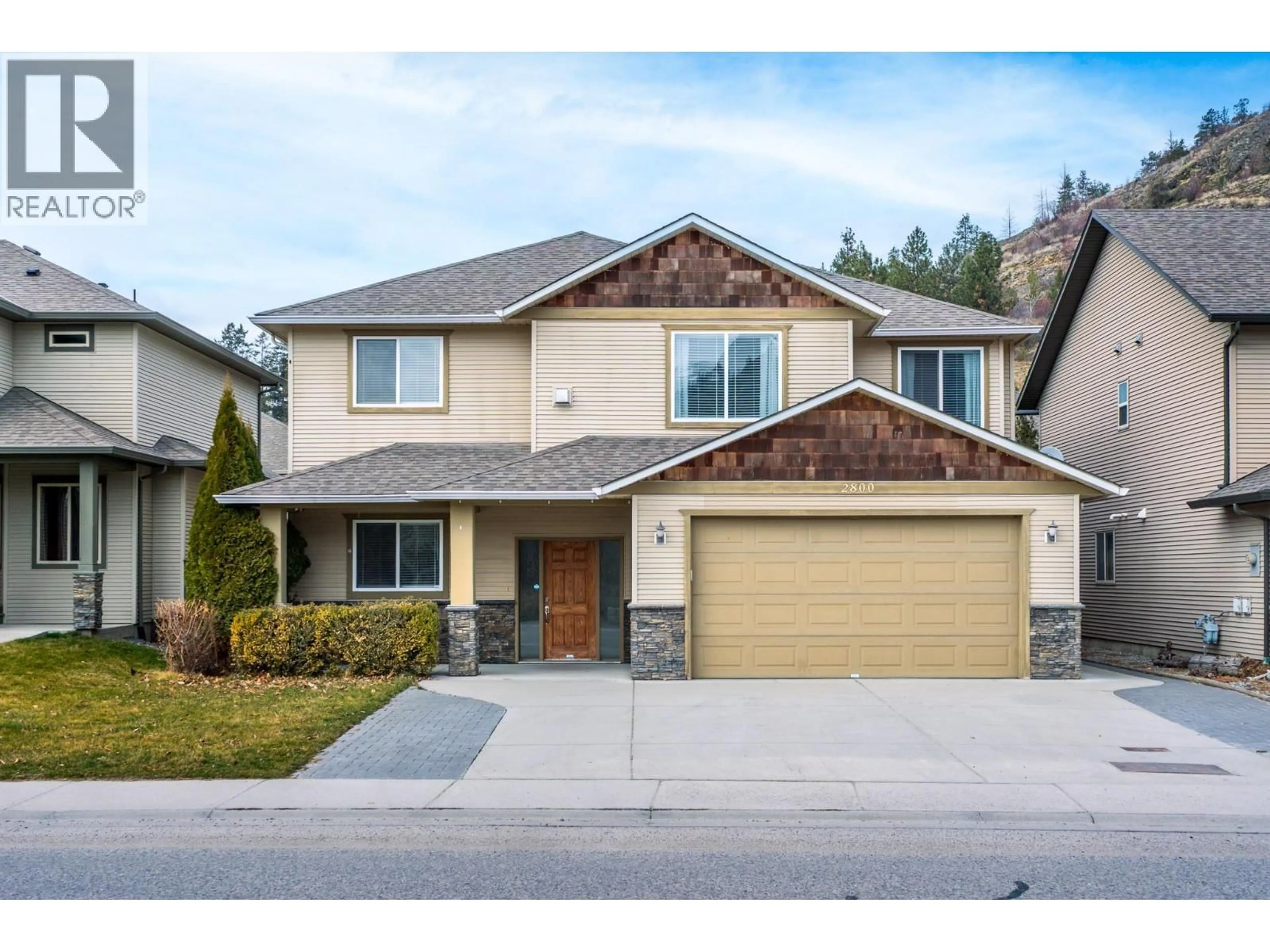 Home with vinyl exterior material, street for 2800 AUBURN ROAD, West Kelowna British Columbia V4T3J3