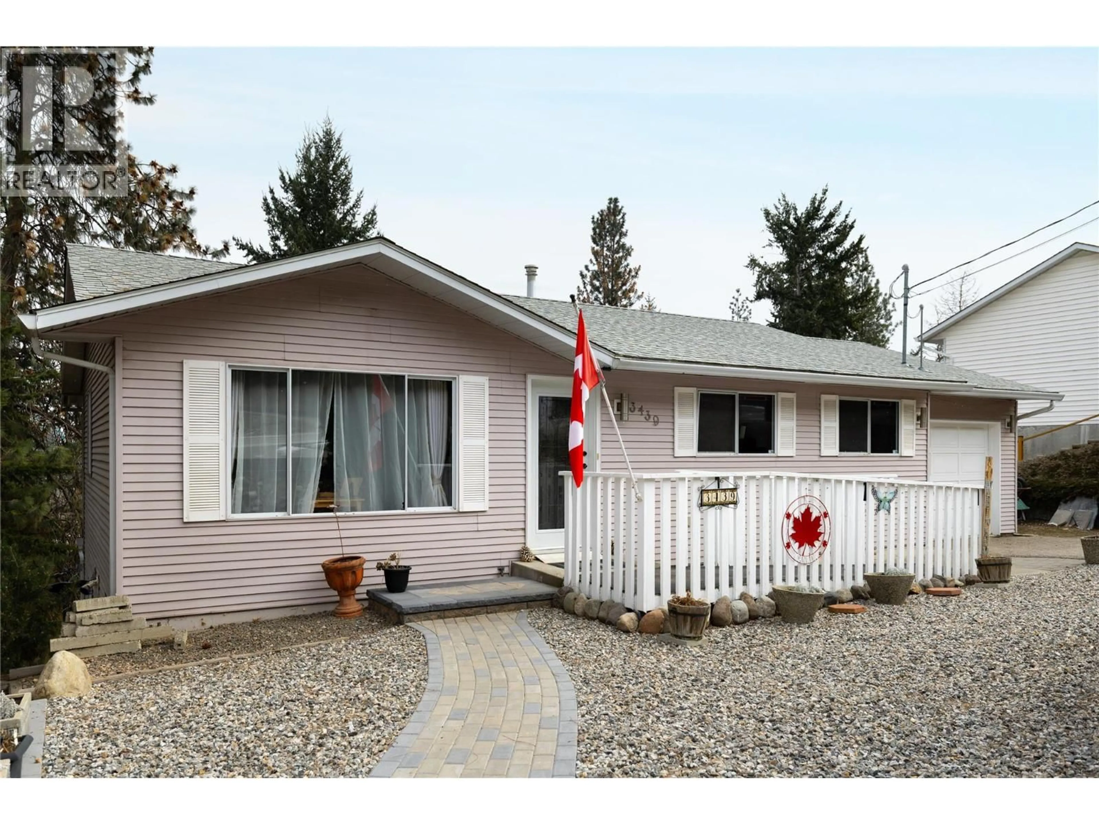 Home with vinyl exterior material, street for 3439 MCIVER ROAD, West Kelowna British Columbia V4T1H7