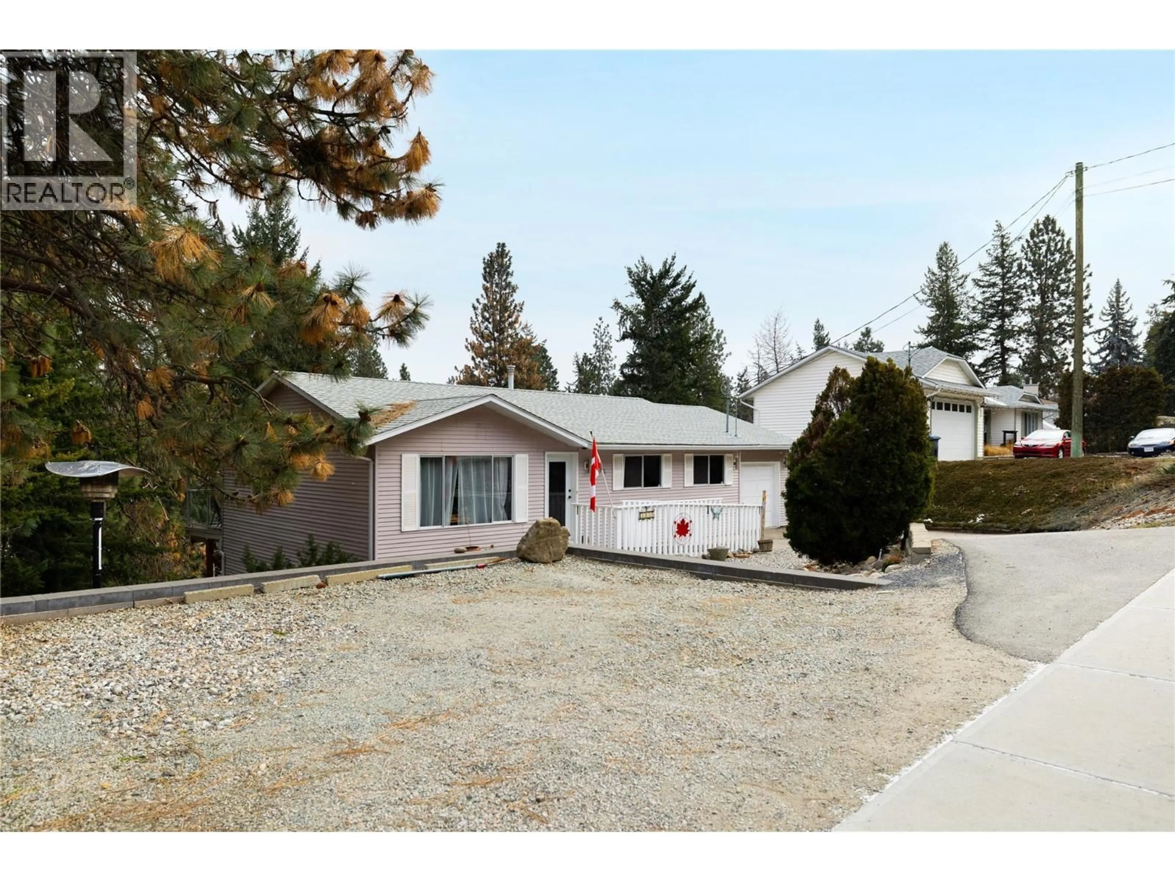 Home with vinyl exterior material, street for 3439 MCIVER ROAD, West Kelowna British Columbia V4T1H7