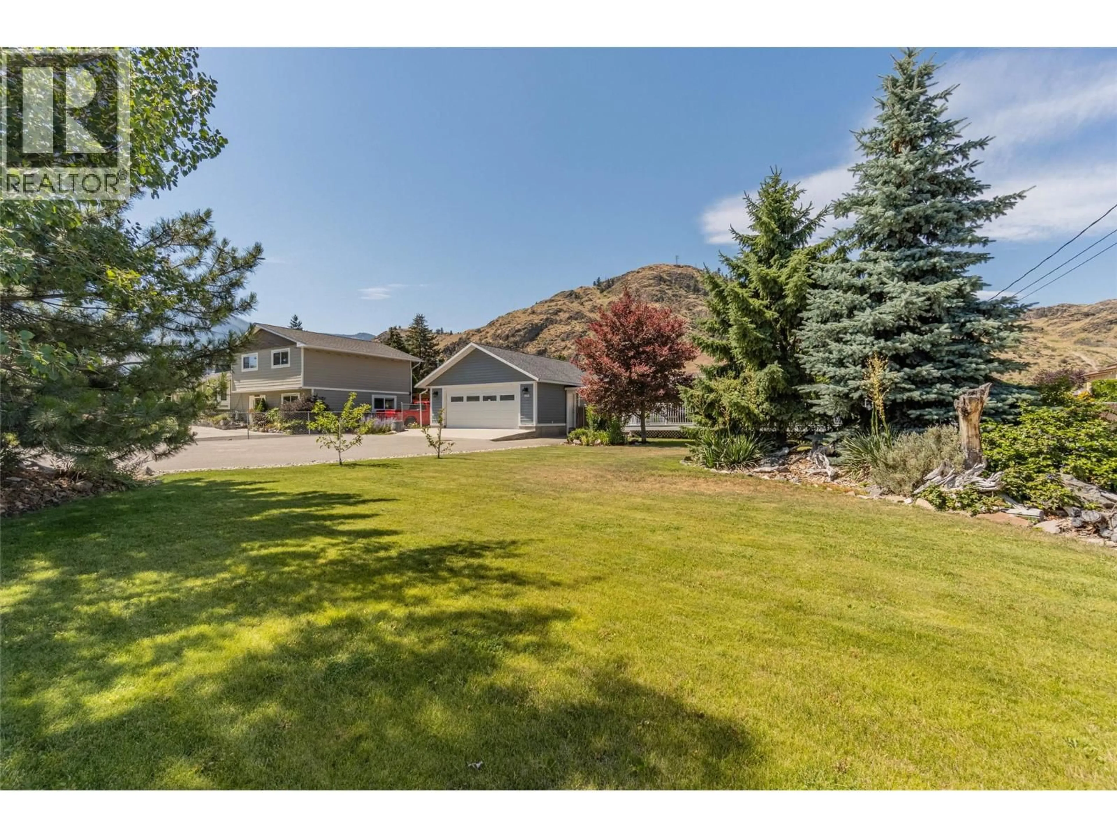 A pic from outside/outdoor area/front of a property/back of a property/a pic from drone, mountain view for 860 FAIRVIEW ROAD, Oliver British Columbia V0H1T6