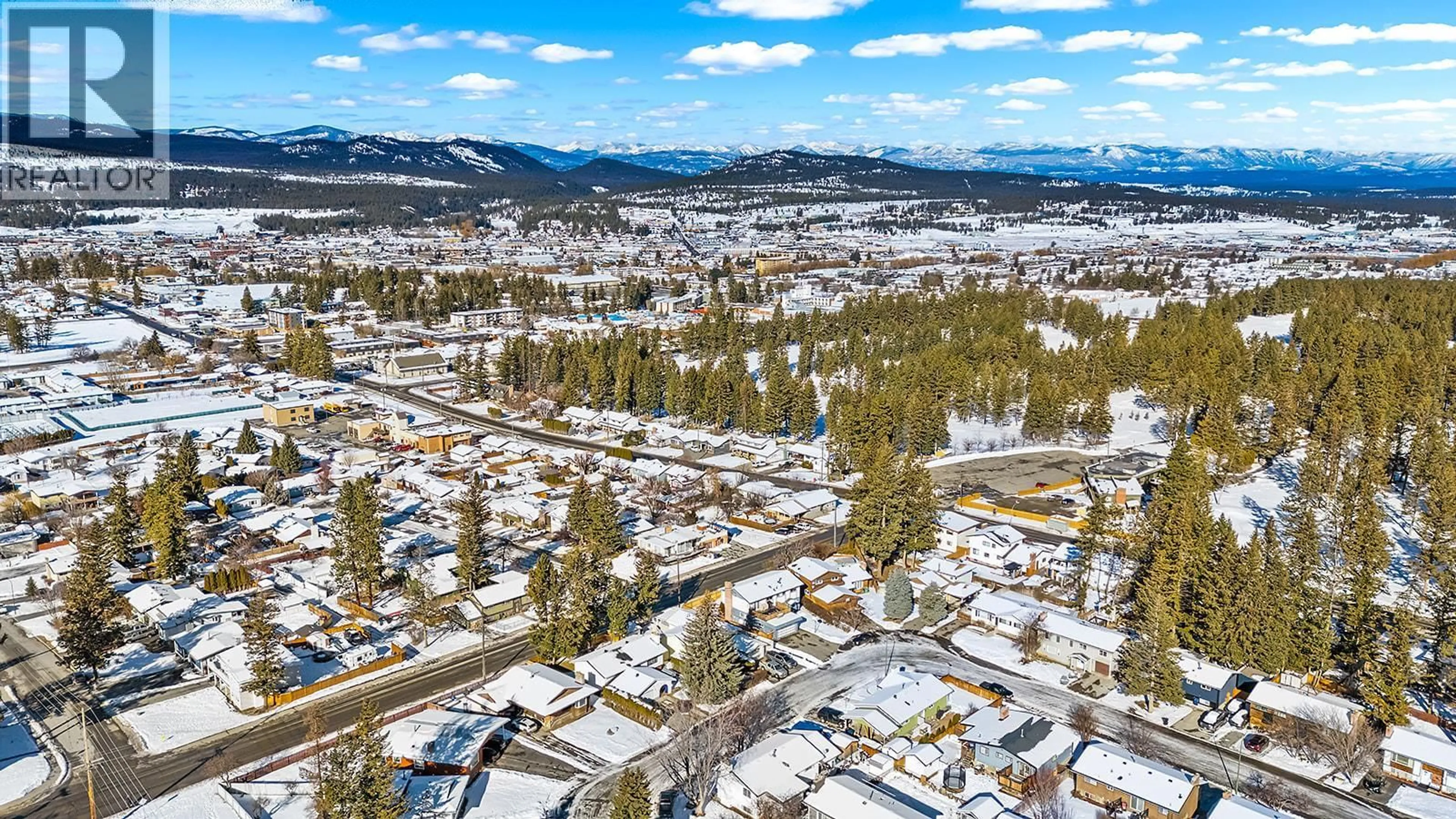 A pic from outside/outdoor area/front of a property/back of a property/a pic from drone, mountain view for 2708 2A STREET SOUTH, Cranbrook British Columbia V1C5B3
