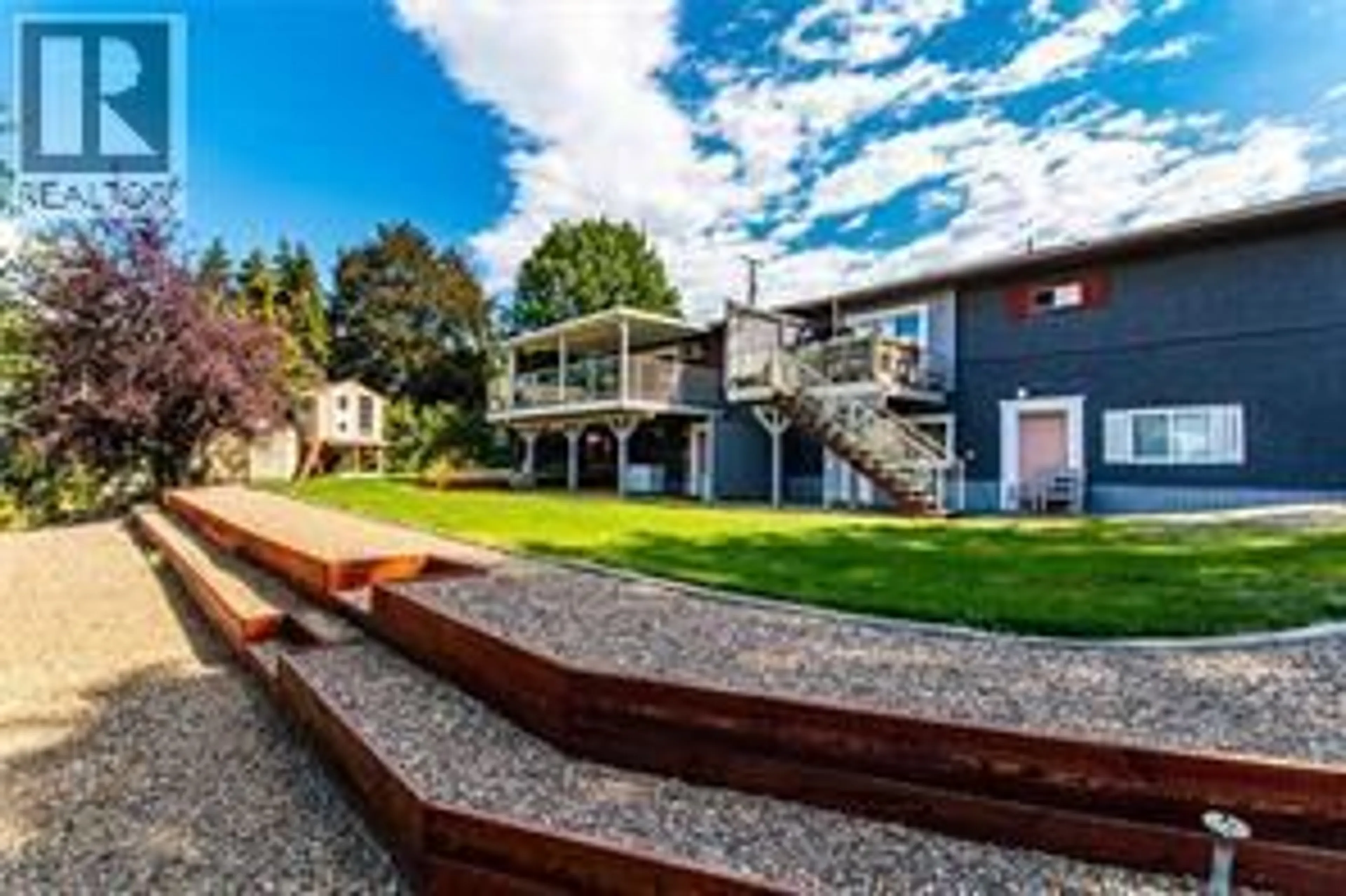 A pic from outside/outdoor area/front of a property/back of a property/a pic from drone, mountain view for 4904 PLEASANT VALLEY ROAD, Vernon British Columbia V1B3L7