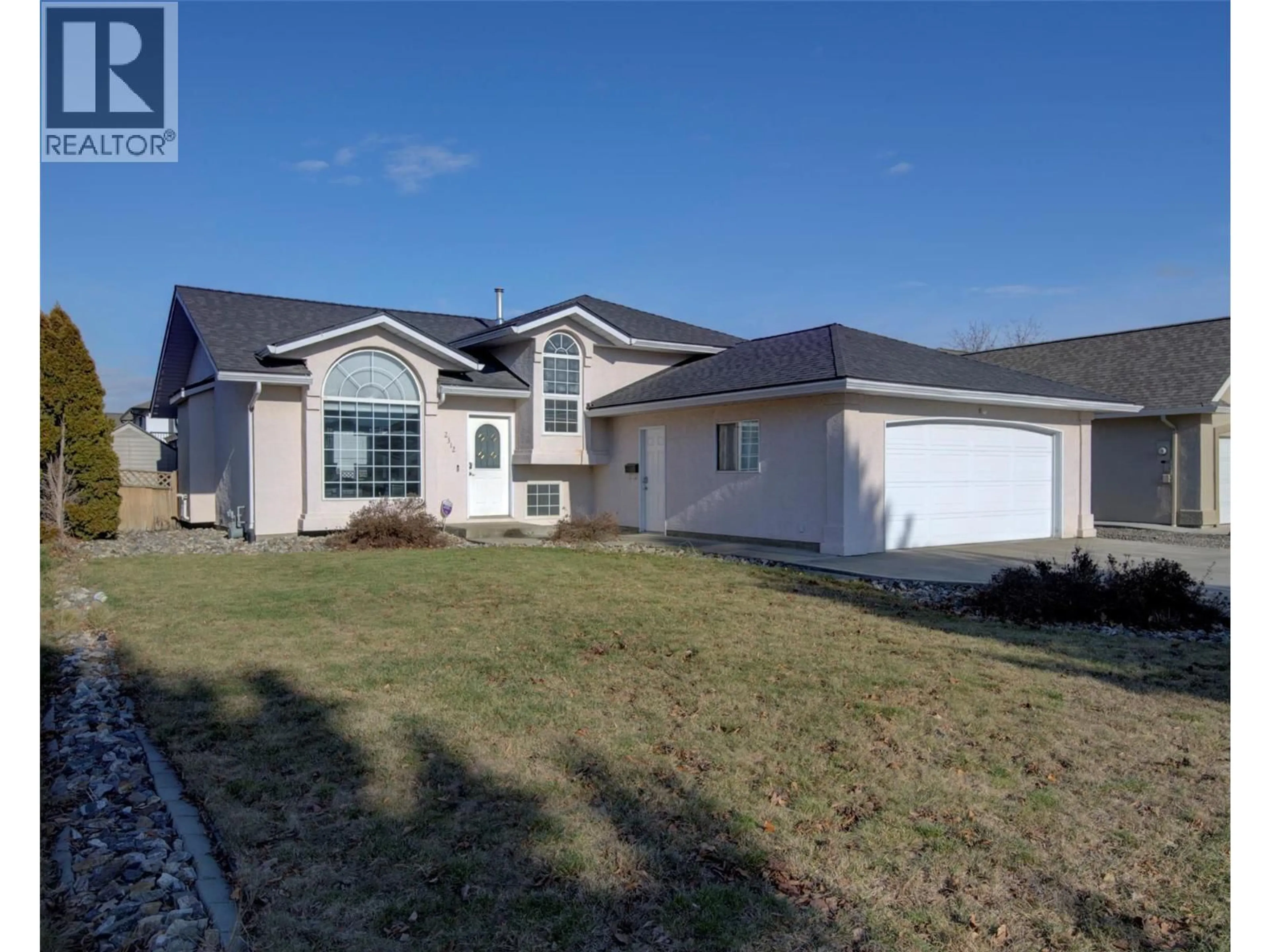 Home with vinyl exterior material, street for 2312 HUNTER AVENUE, Armstrong British Columbia V4Y0C1