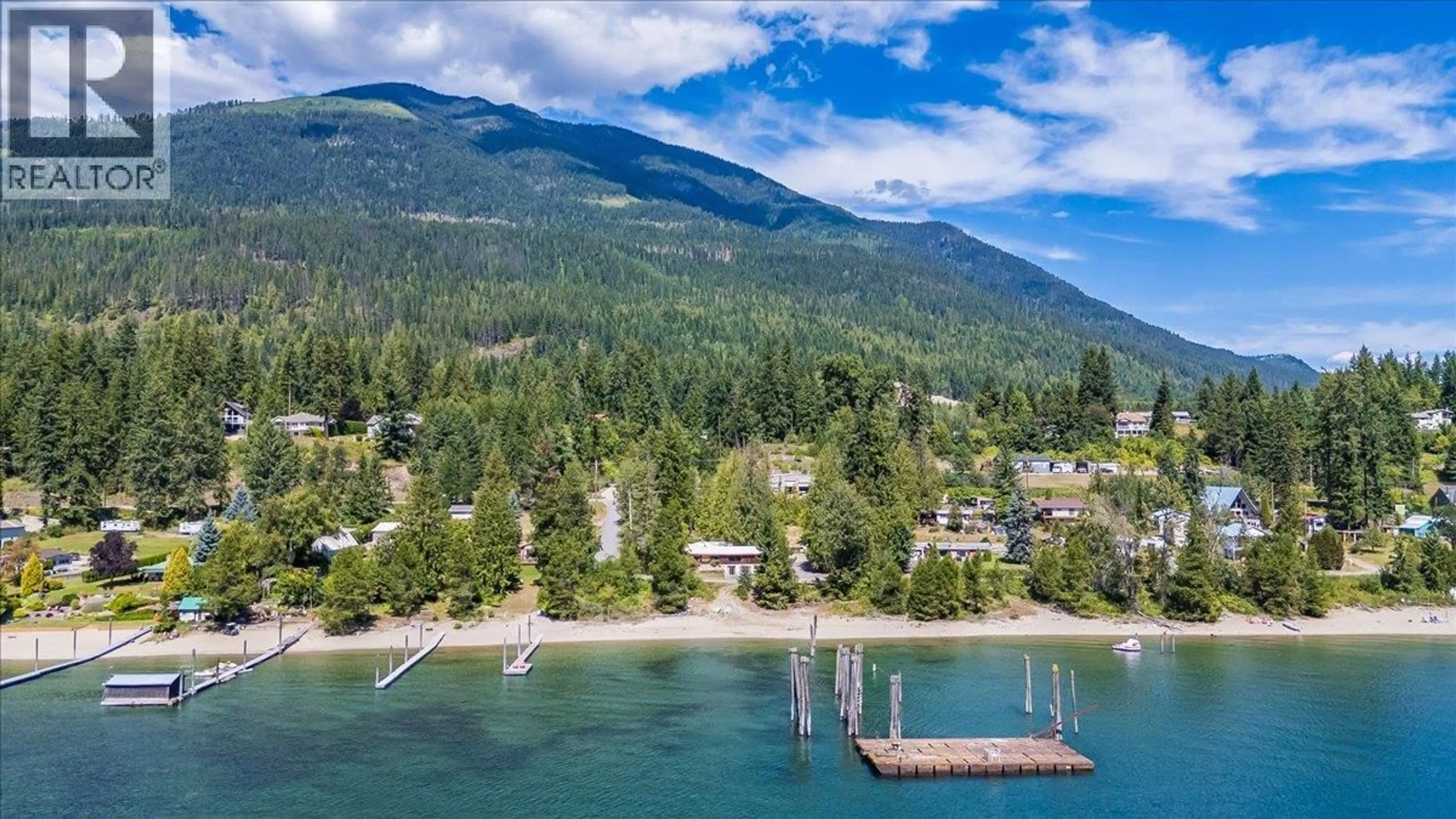 A pic from outside/outdoor area/front of a property/back of a property/a pic from drone, water/lake/river/ocean view for 7691 BALFOUR WHARF ROAD, Balfour British Columbia V0G1C0