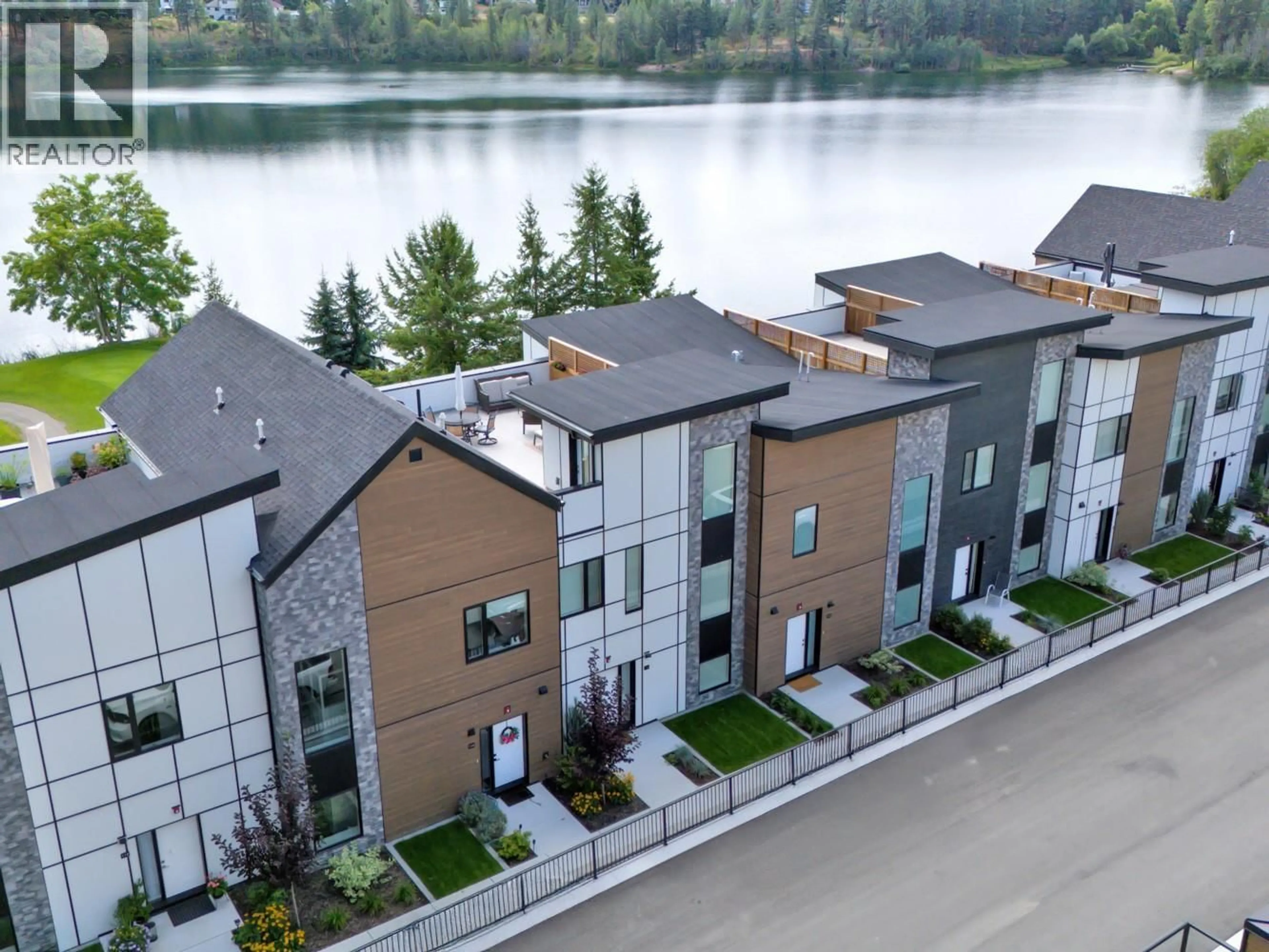 A pic from outside/outdoor area/front of a property/back of a property/a pic from drone, water/lake/river/ocean view for 114 - 2735 SHANNON LAKE ROAD, West Kelowna British Columbia V4T1V6