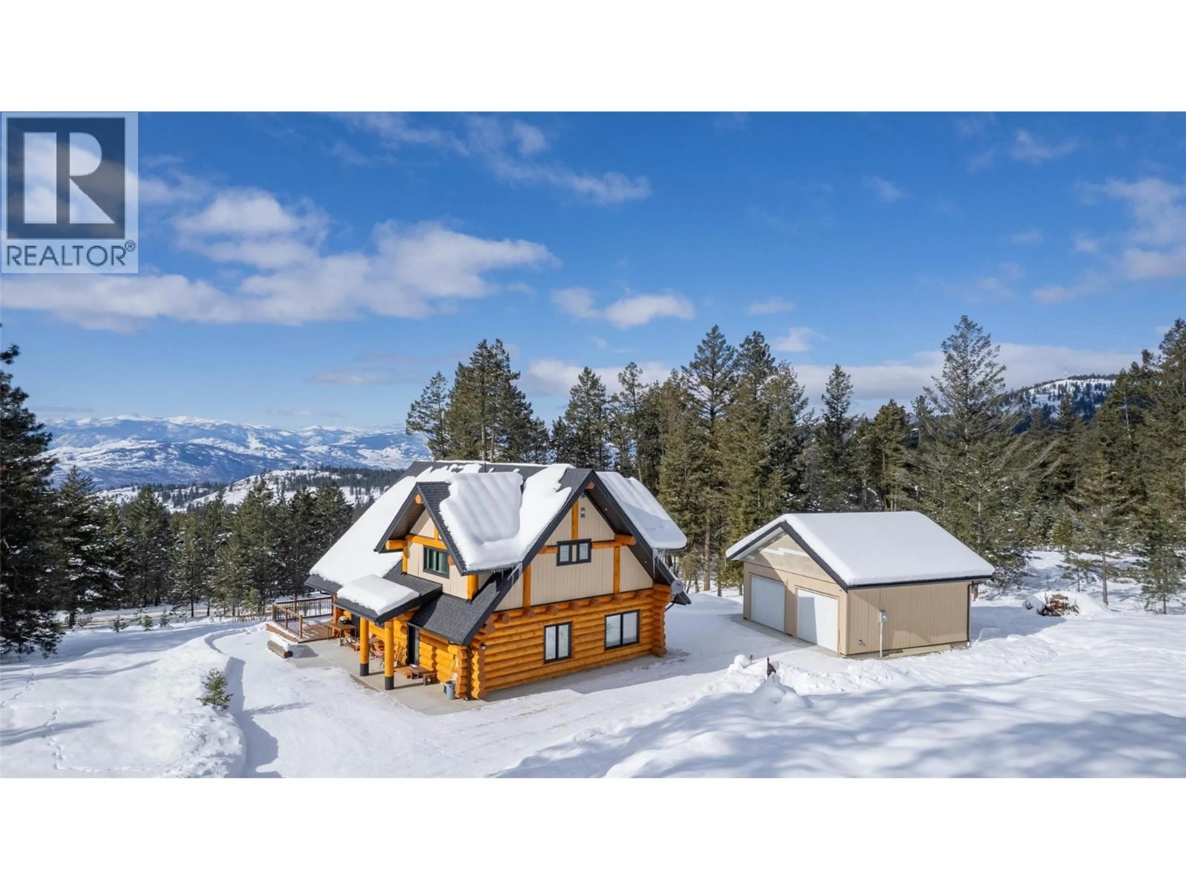 A pic from outside/outdoor area/front of a property/back of a property/a pic from drone, mountain view for 185 CARIBOU WAY, Osoyoos British Columbia V0H1V6