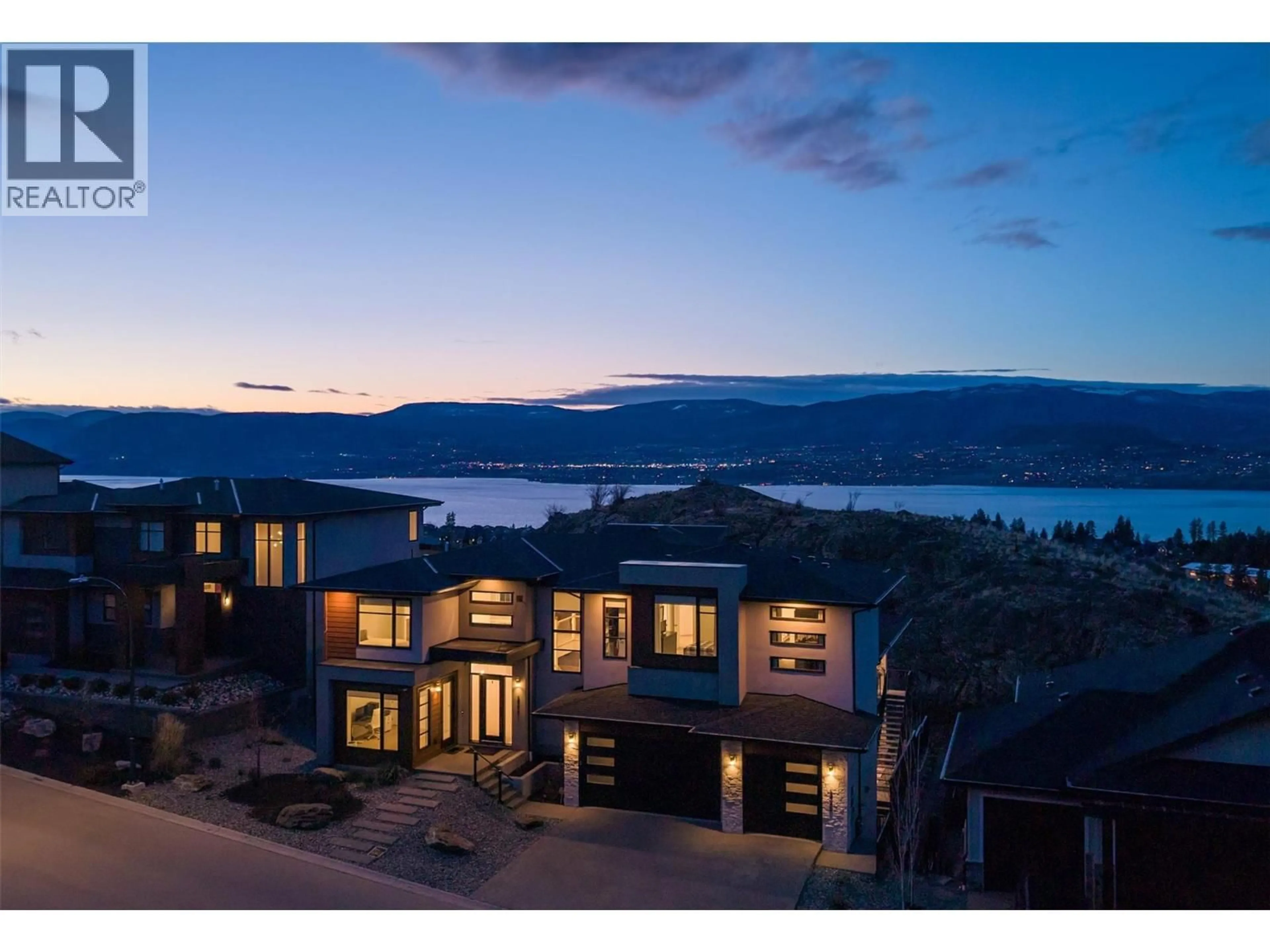 A pic from outside/outdoor area/front of a property/back of a property/a pic from drone, water/lake/river/ocean view for 5442 UPPER MISSION DRIVE, Kelowna British Columbia V1W0B1
