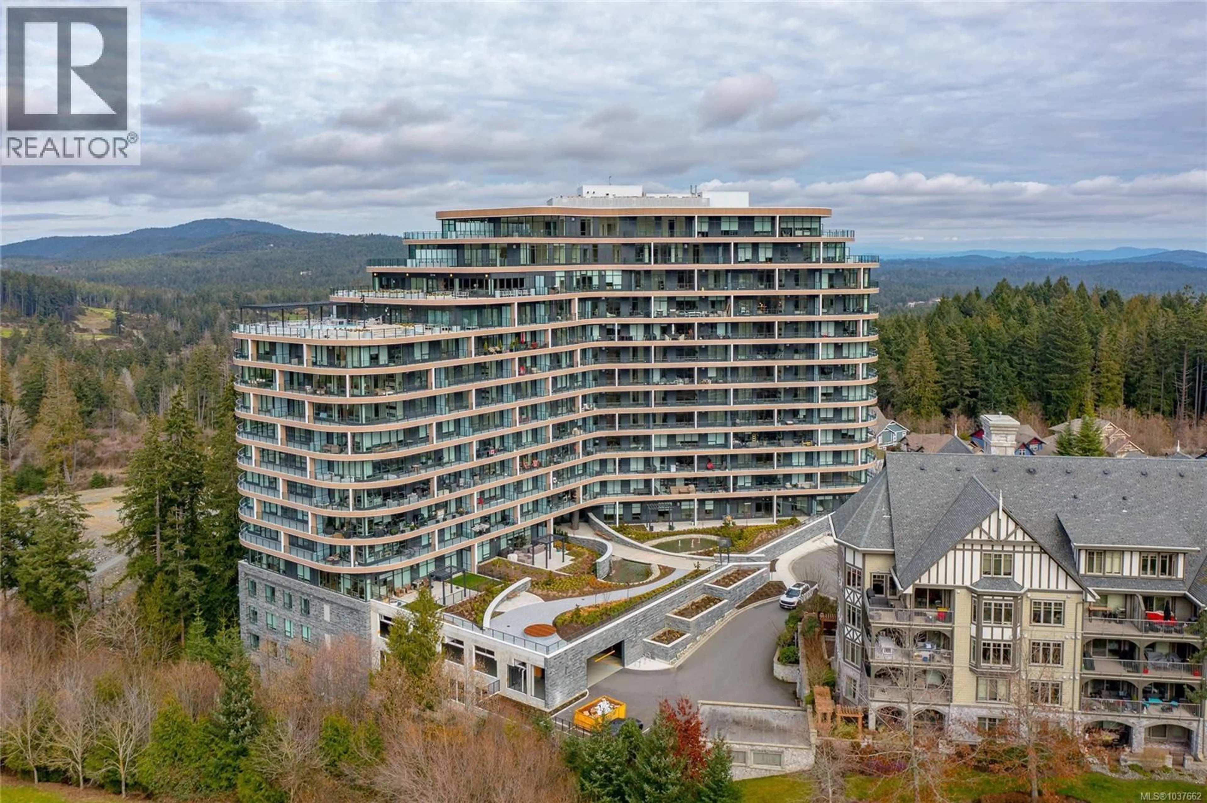A pic from outside/outdoor area/front of a property/back of a property/a pic from drone, mountain view for 803 - 2000 HANNINGTON ROAD, Langford British Columbia V9B6R6