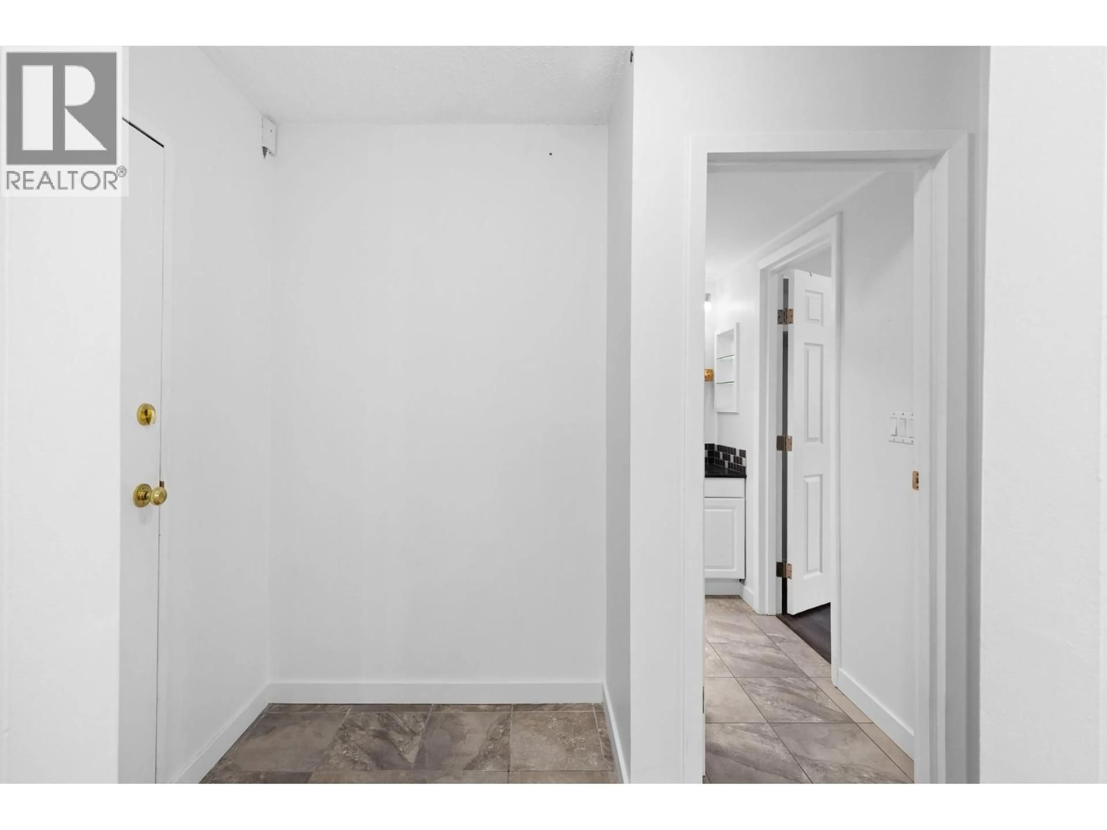 Indoor entryway for 112 - 445 ALL STAR COURT, Kelowna British Columbia V1X5N7