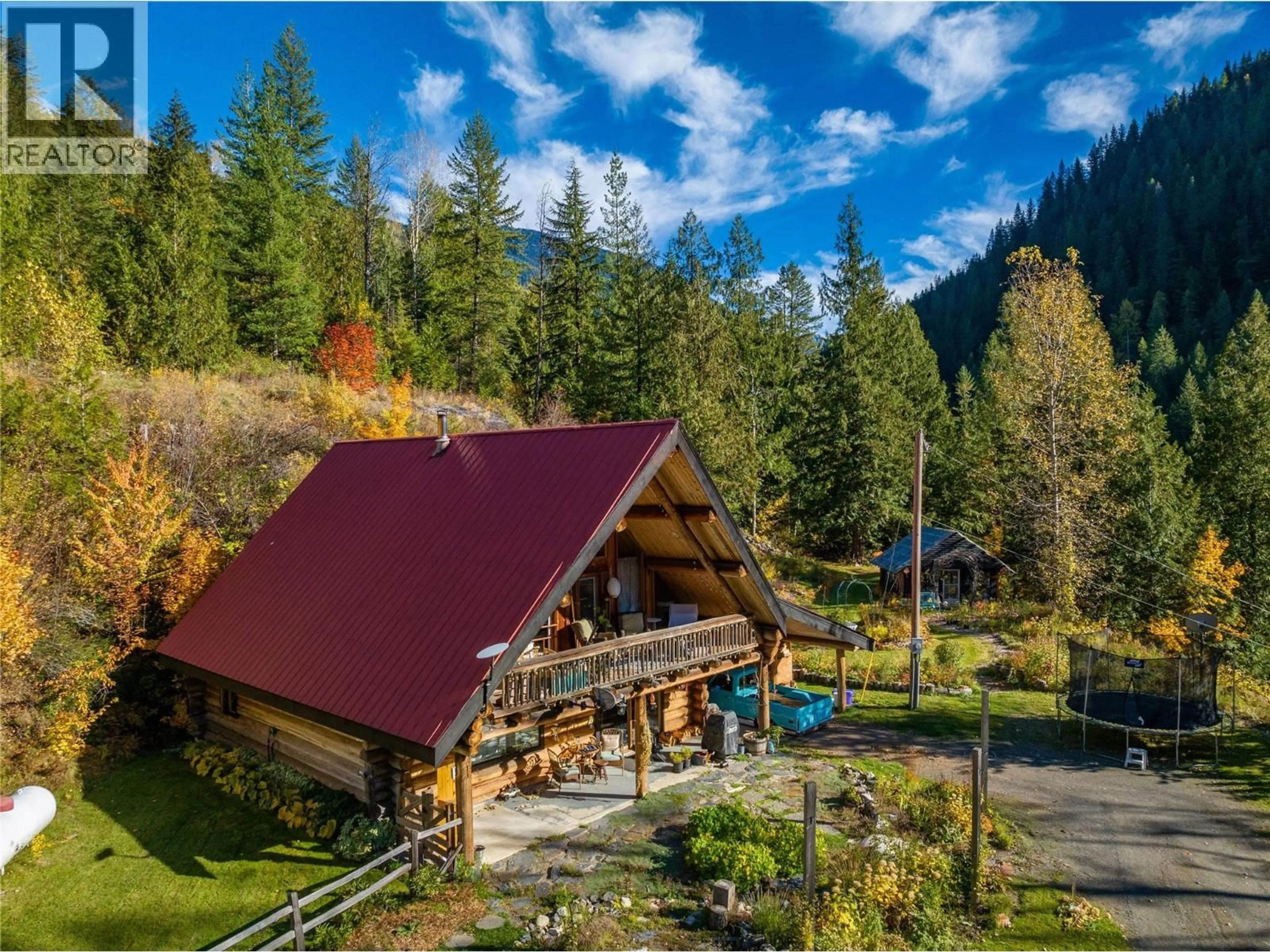 A pic from outside/outdoor area/front of a property/back of a property/a pic from drone, mountain view for 122 SILVER STREET, Sandon British Columbia V0G1S0