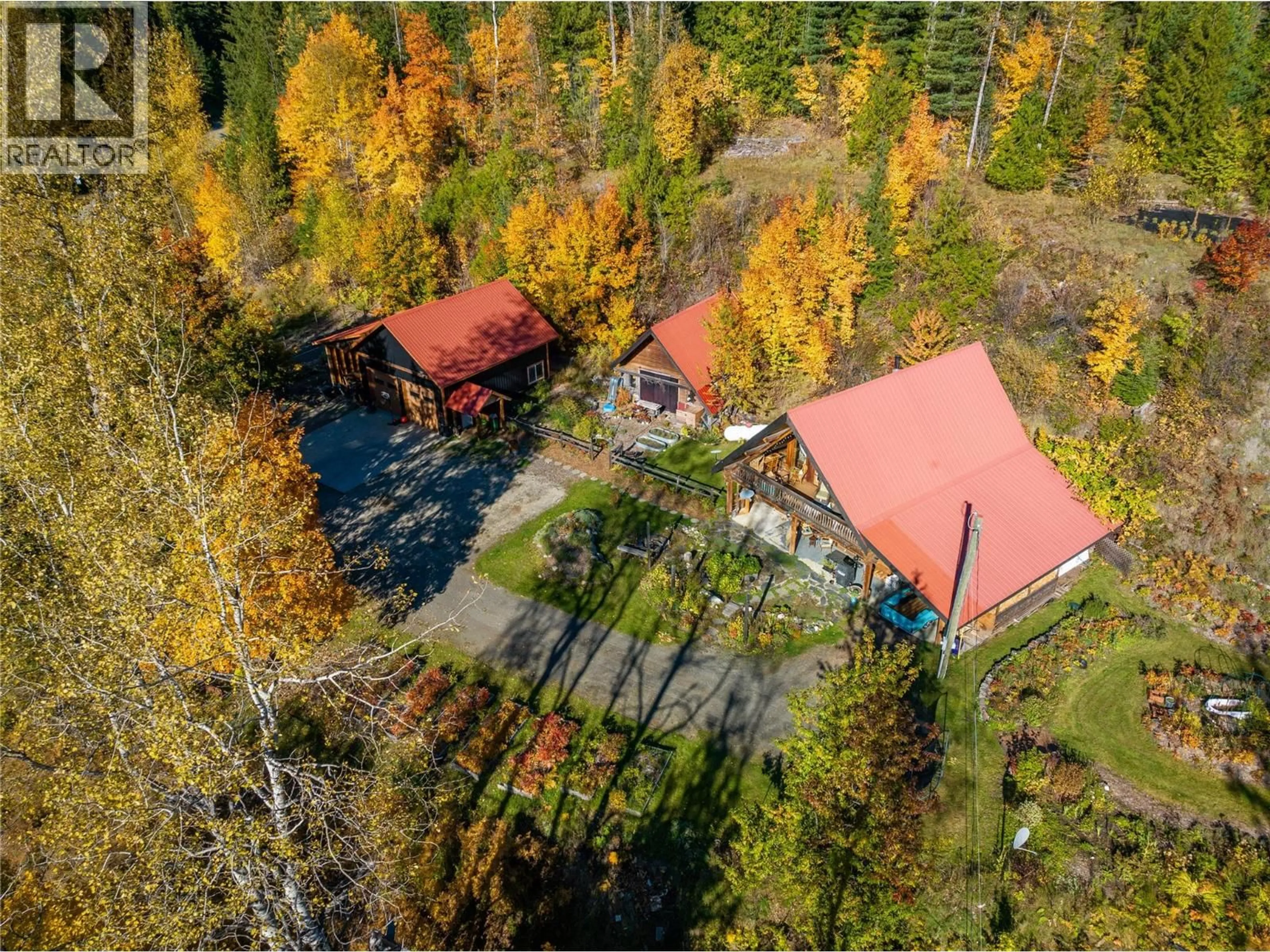 A pic from outside/outdoor area/front of a property/back of a property/a pic from drone, forest/trees view for 122 SILVER STREET, Sandon British Columbia V0G1S0