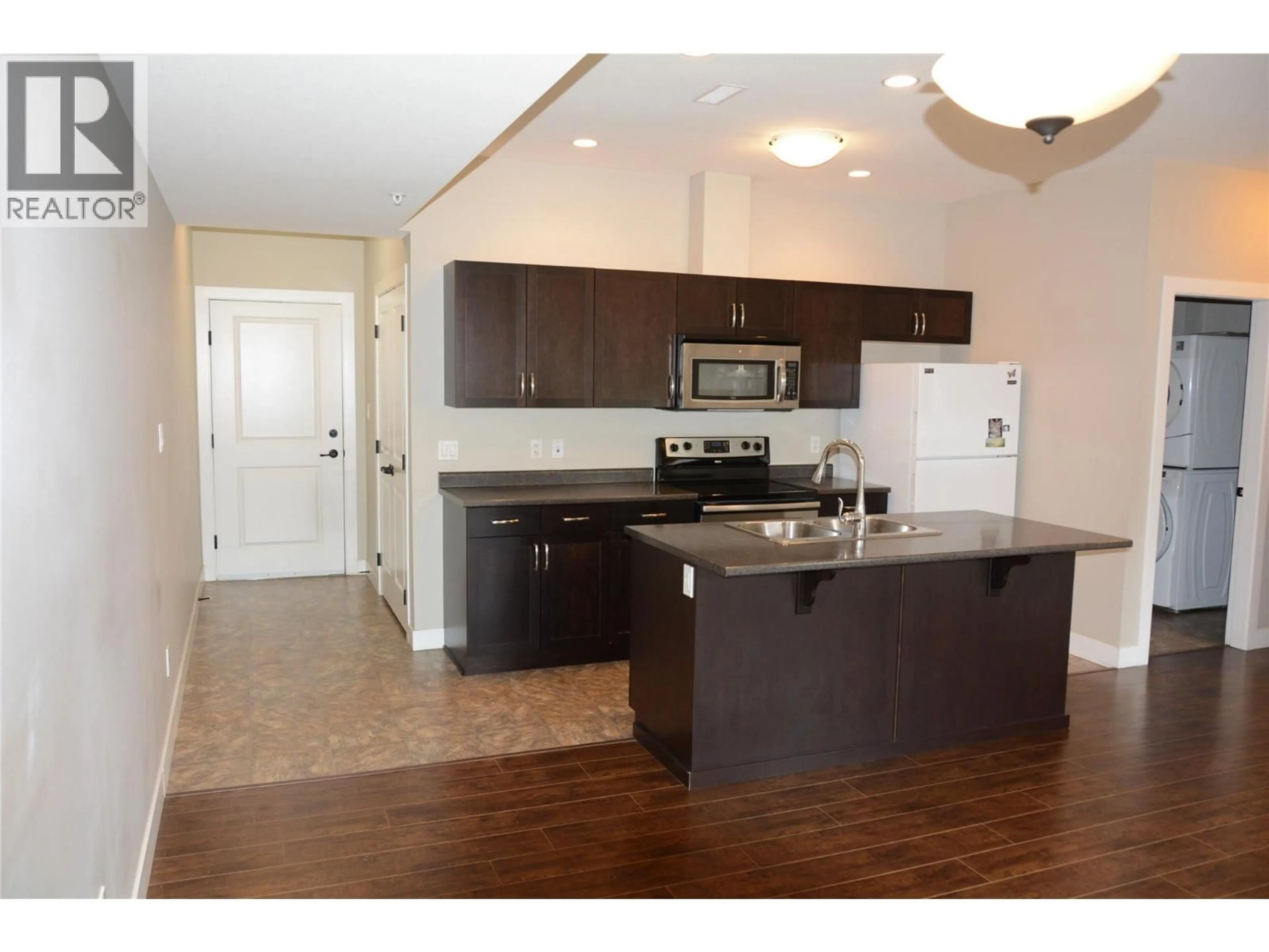 Open concept kitchen, wood/laminate floor for 509 - 5170 DALLAS DRIVE, Kamloops British Columbia V2C0C7
