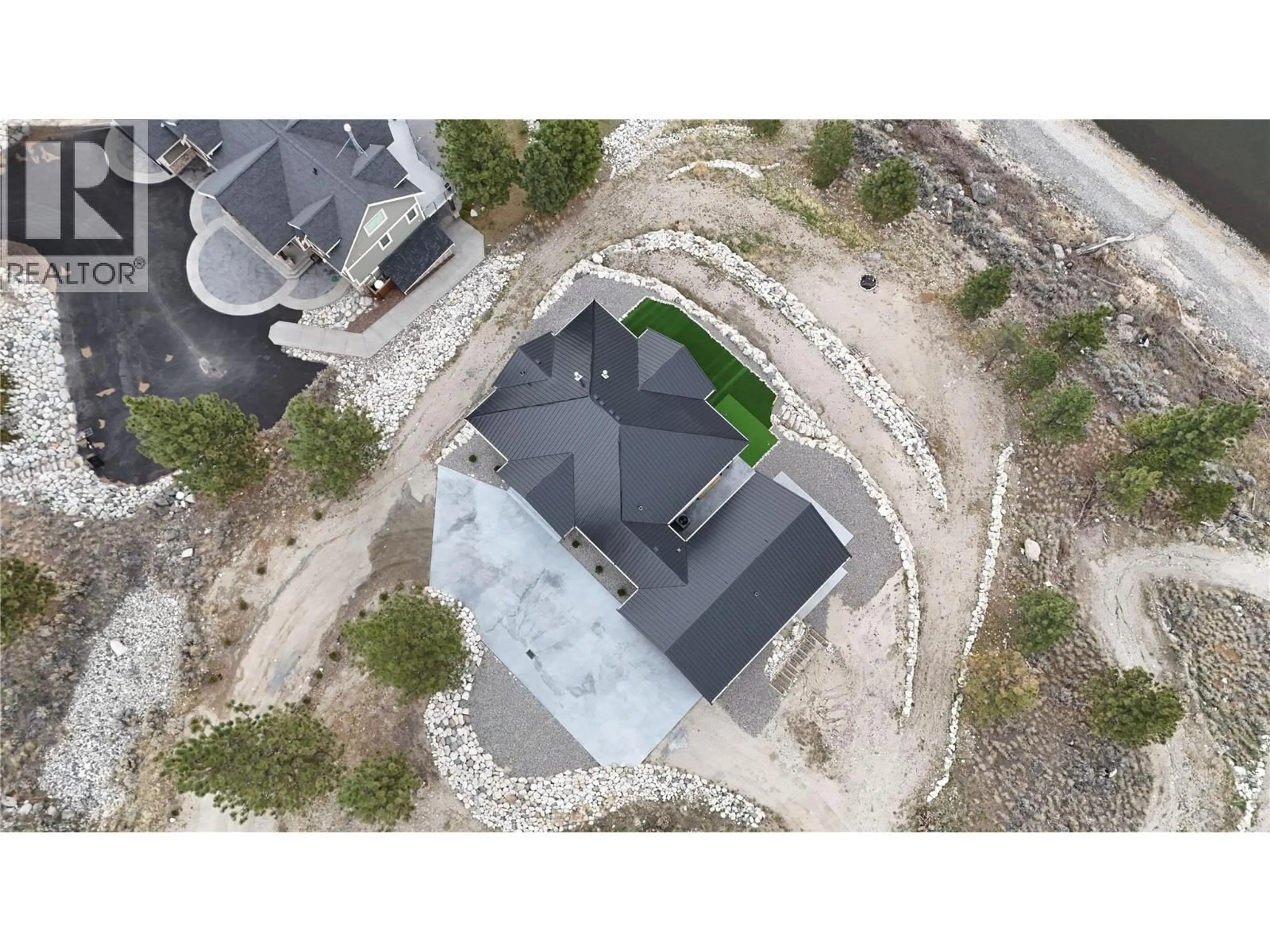 A pic from outside/outdoor area/front of a property/back of a property/a pic from drone, street for 6472 MONCK PARK ROAD, Merritt British Columbia V1K1A0