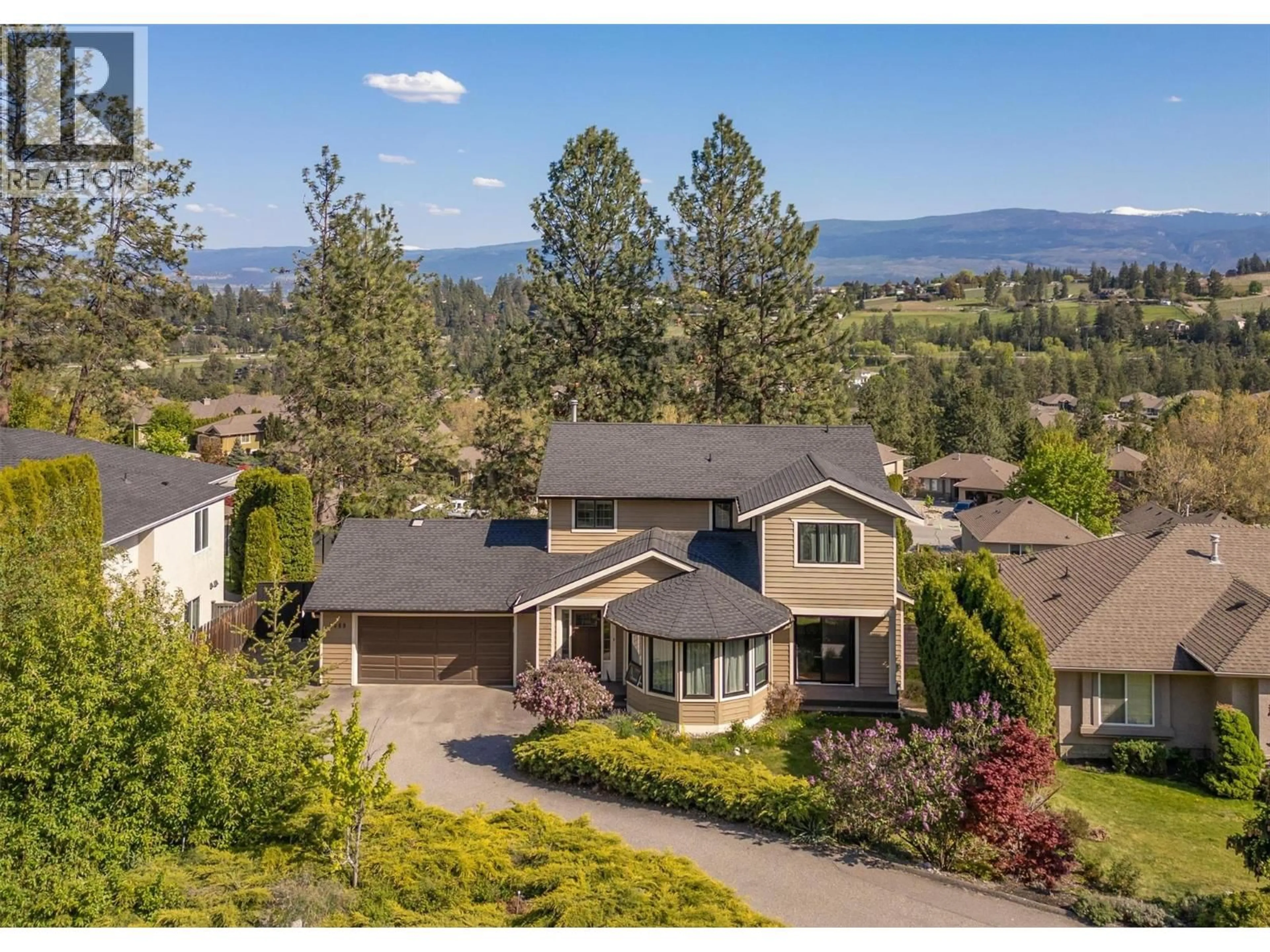 A pic from outside/outdoor area/front of a property/back of a property/a pic from drone, mountain view for 2069 HORIZON DRIVE, West Kelowna British Columbia V1Z3N4