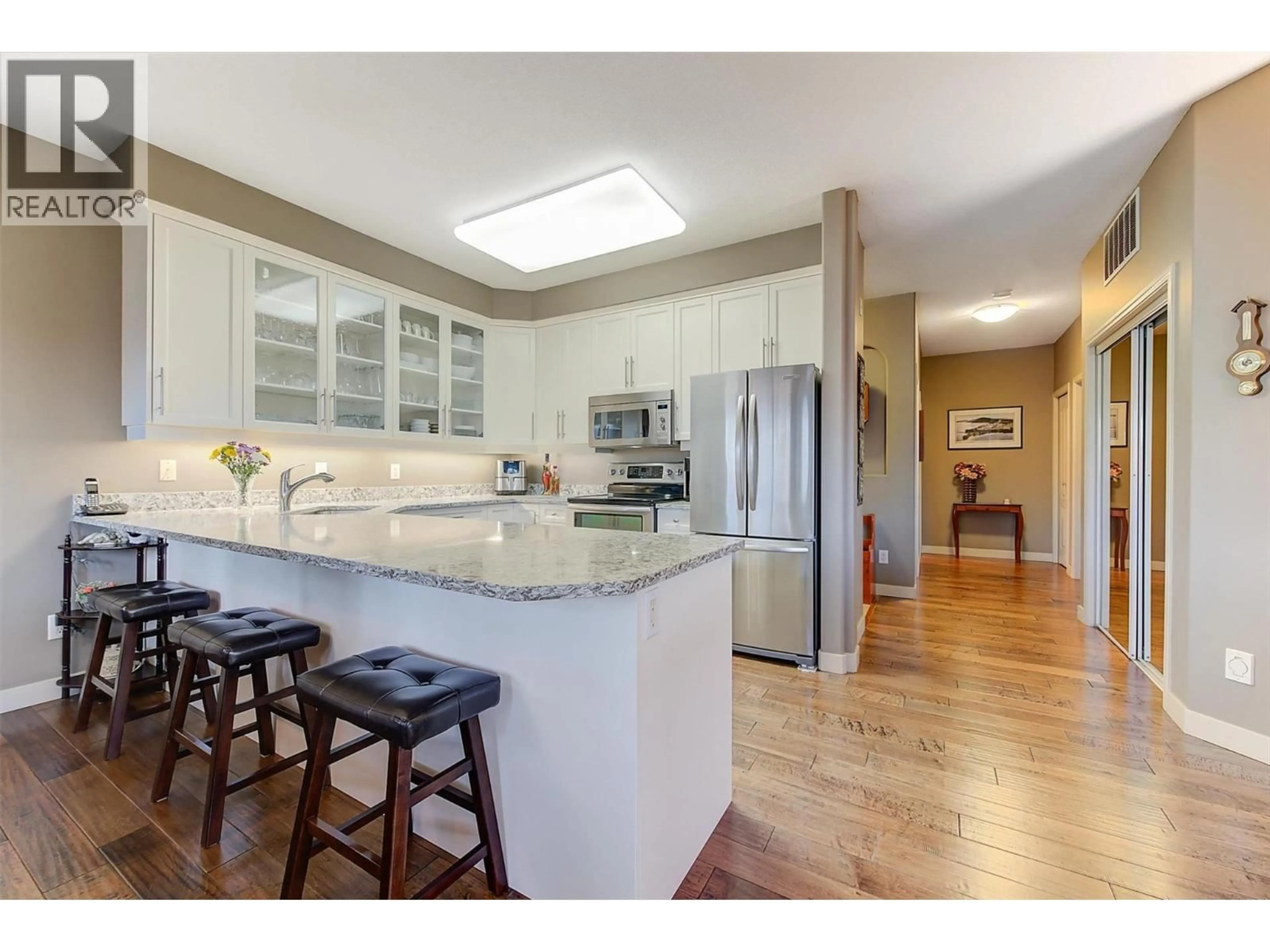 Open concept kitchen, unknown for 102 - 2300 BENVOULIN ROAD, Kelowna British Columbia V1W2C6