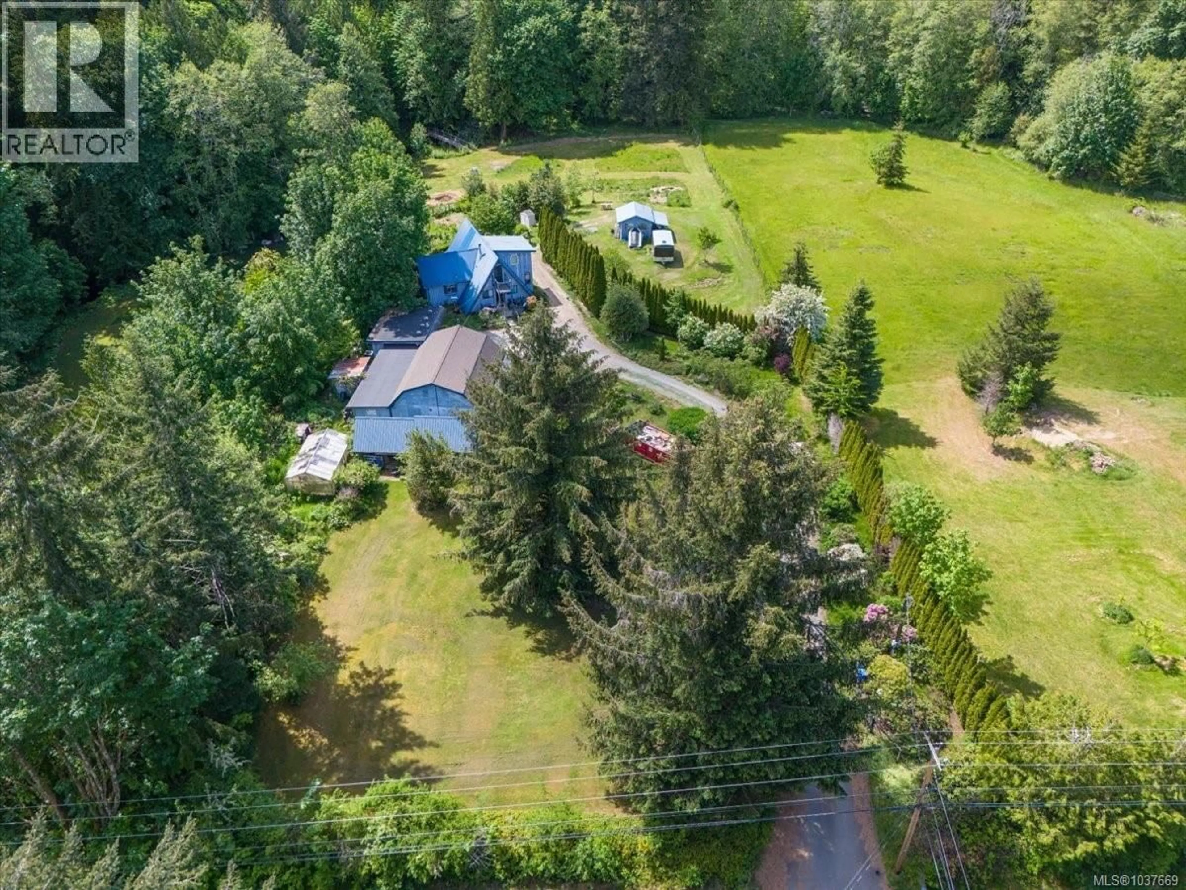 A pic from outside/outdoor area/front of a property/back of a property/a pic from drone, forest/trees view for 1271 WINCHESTER ROAD, Coombs British Columbia V9K1W9