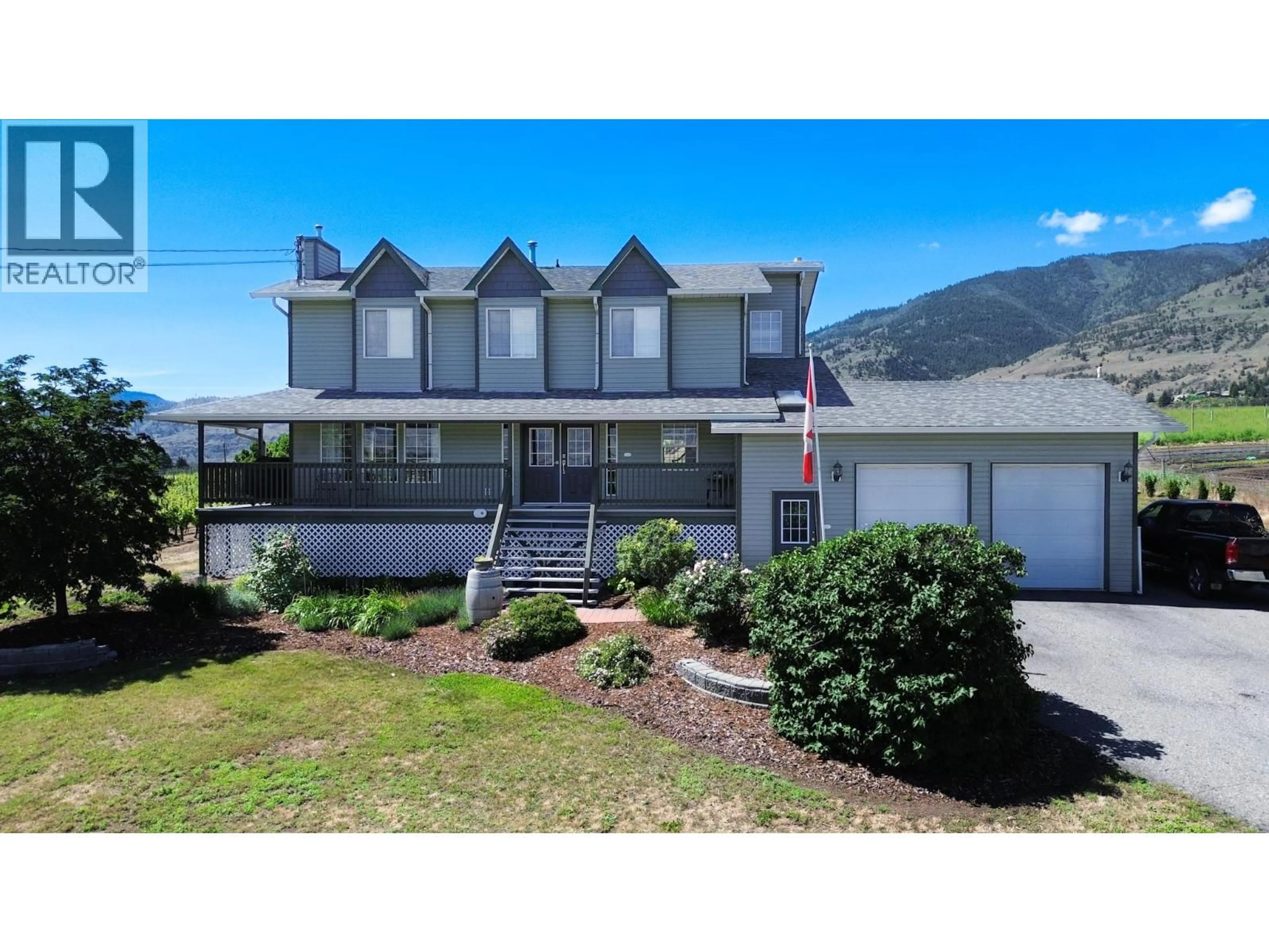 A pic from outside/outdoor area/front of a property/back of a property/a pic from drone, mountain view for 445 ROAD 5 OTHER, Oliver British Columbia V0H1T1