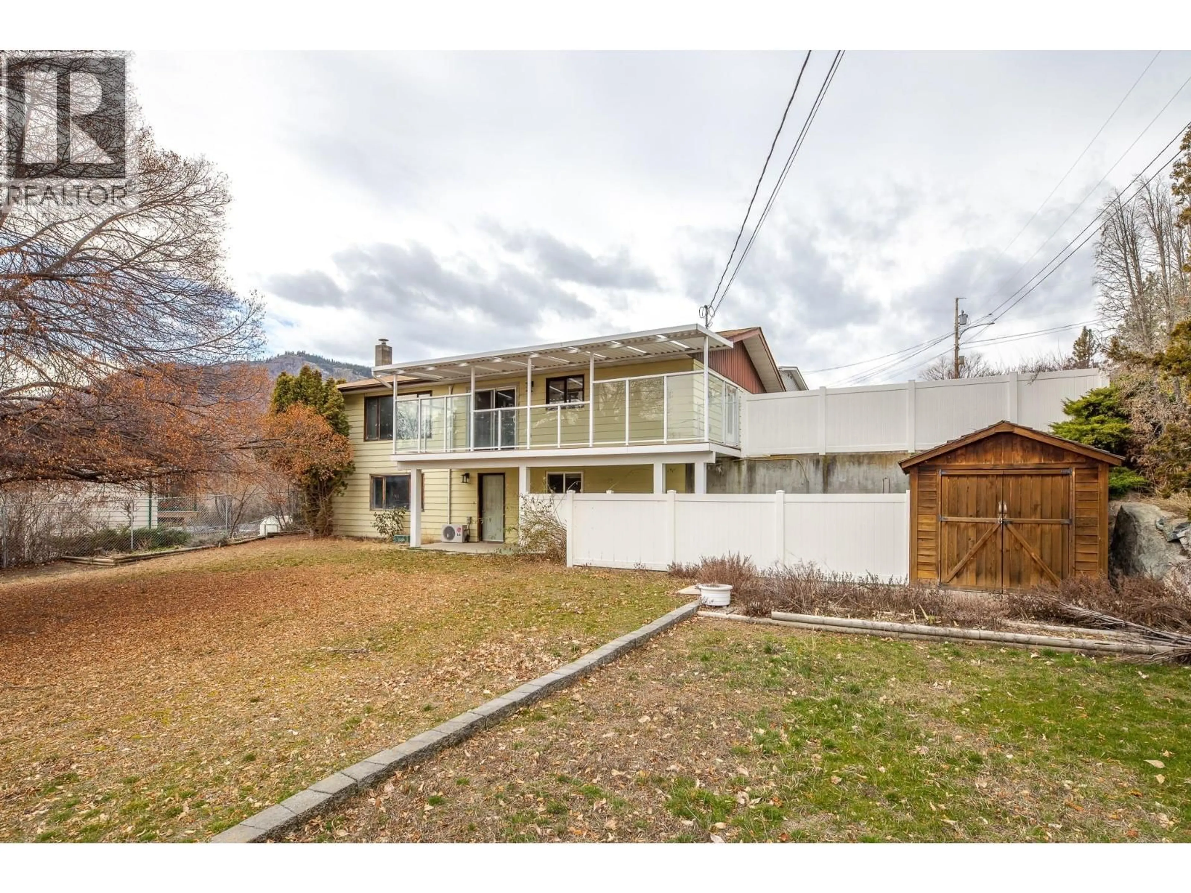 A pic from outside/outdoor area/front of a property/back of a property/a pic from drone, street for 4465 MALLORY CRESCENT, Okanagan Falls British Columbia V0H1R1