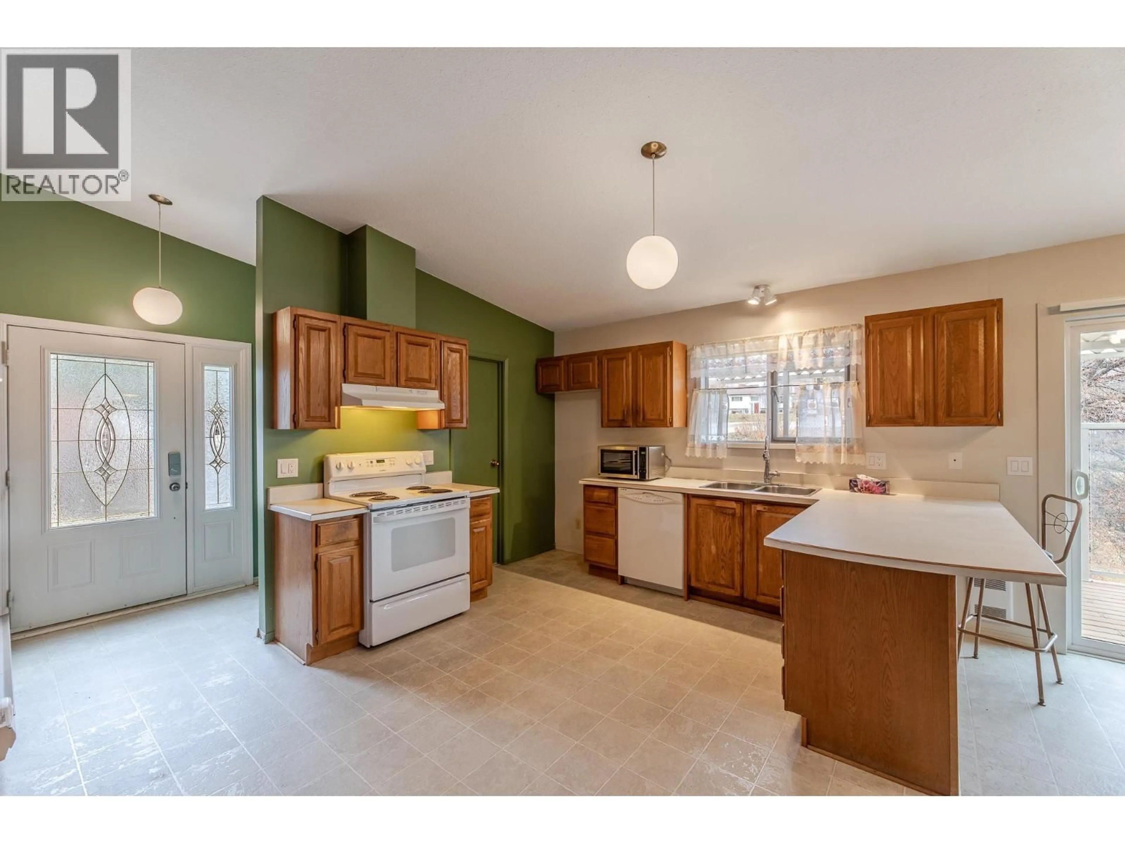 Open concept kitchen, ceramic/tile floor for 4465 MALLORY CRESCENT, Okanagan Falls British Columbia V0H1R1