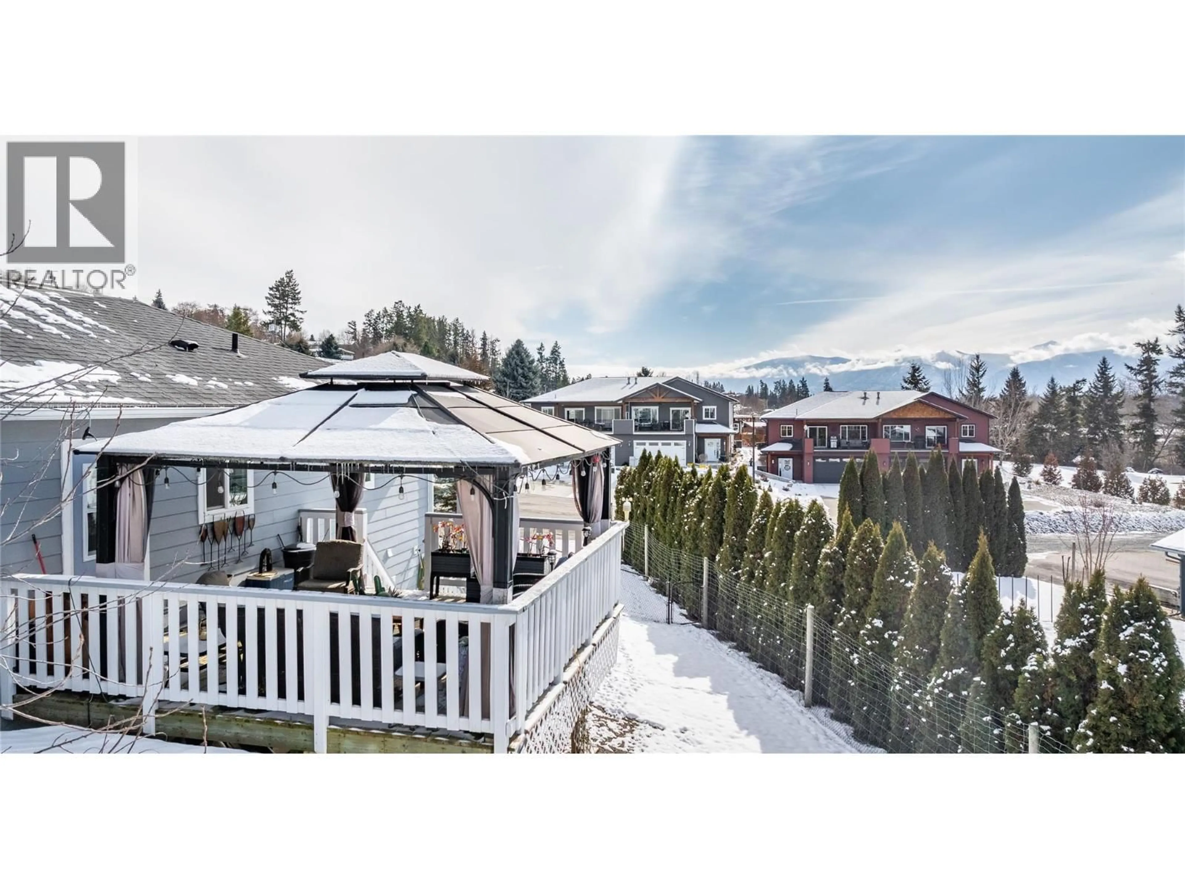 A pic from outside/outdoor area/front of a property/back of a property/a pic from drone, mountain view for 801 HAWKVIEW DRIVE, Creston British Columbia V0B1G3