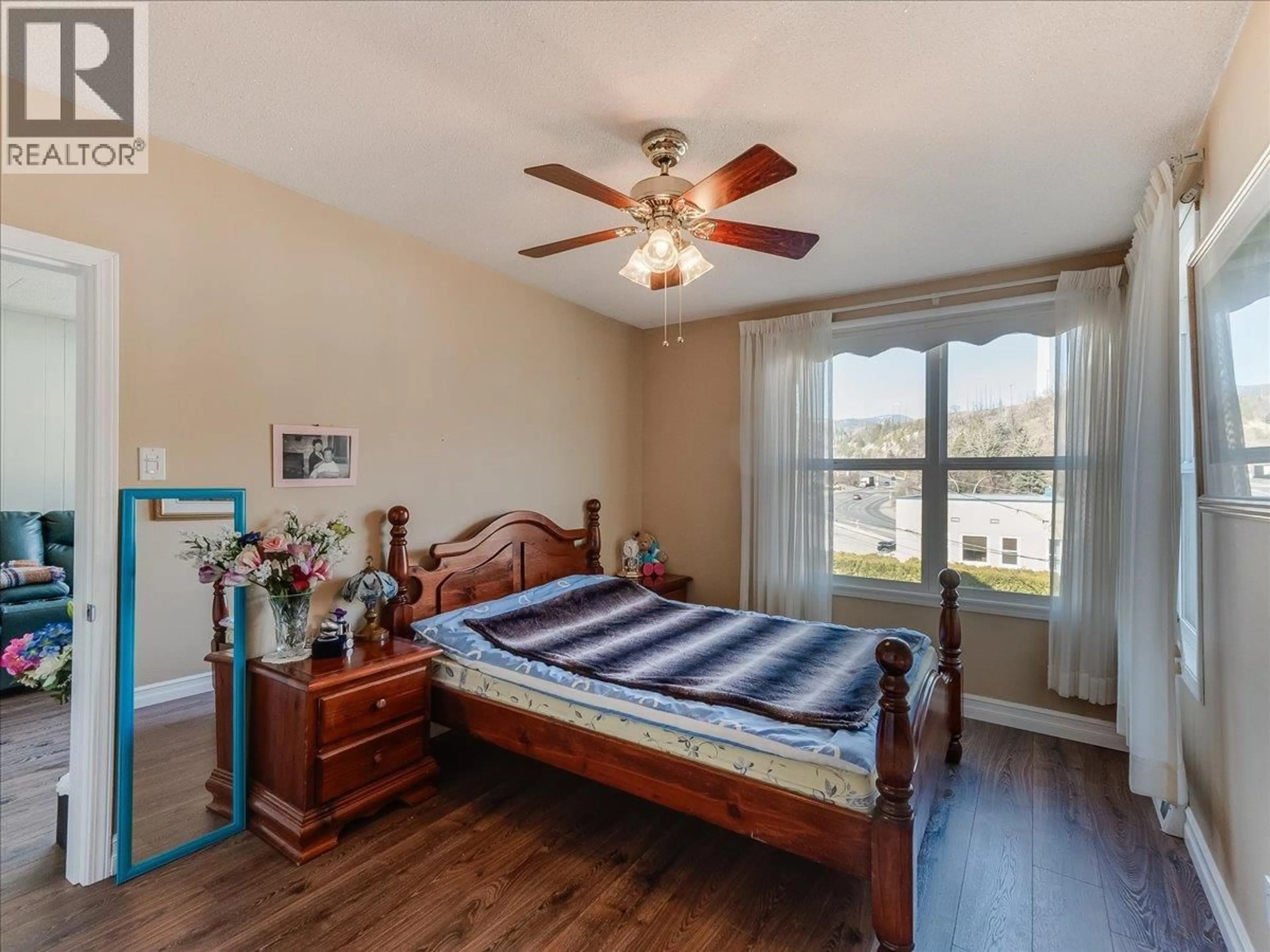 Bedroom with bed, wood/laminate floor for 608 VICTORIA STREET, Trail British Columbia V1R3S8