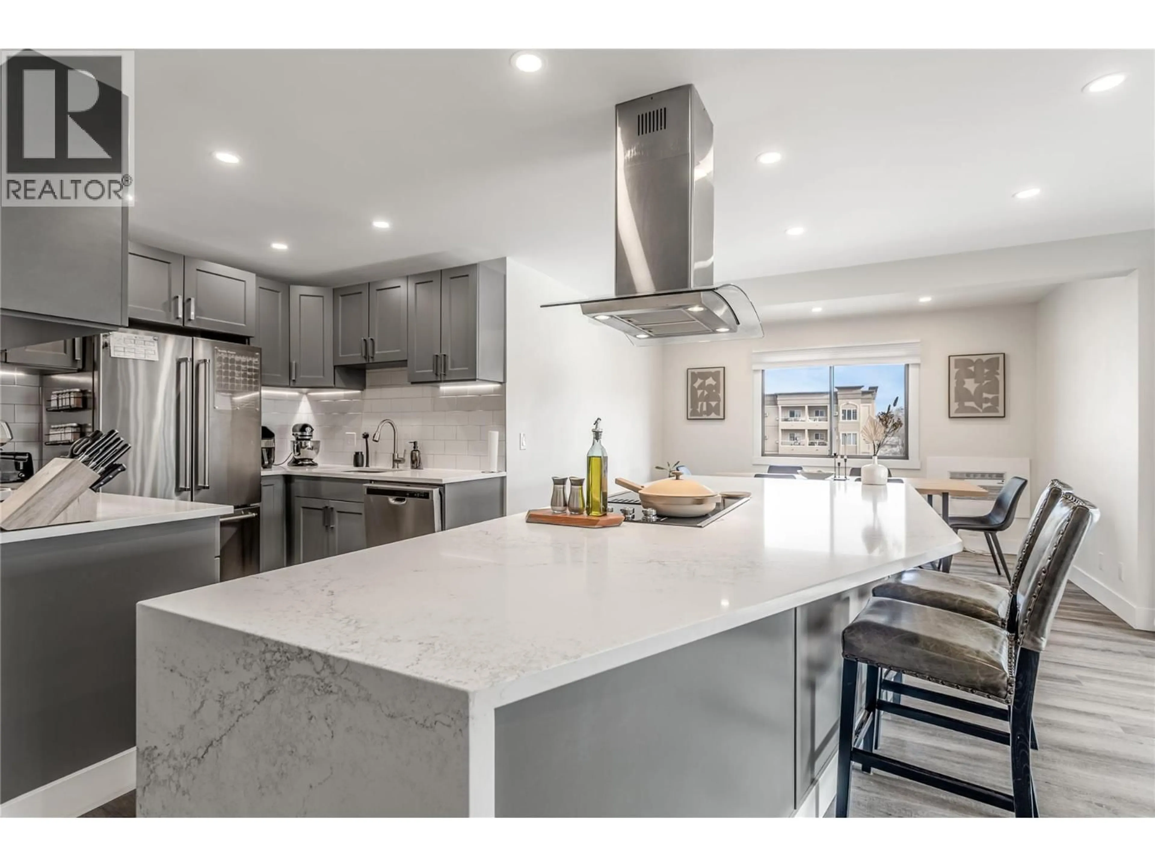 Open concept kitchen, ceramic/tile floor for 305 - 1075 BERNARD AVENUE, Kelowna British Columbia V1Y6P7