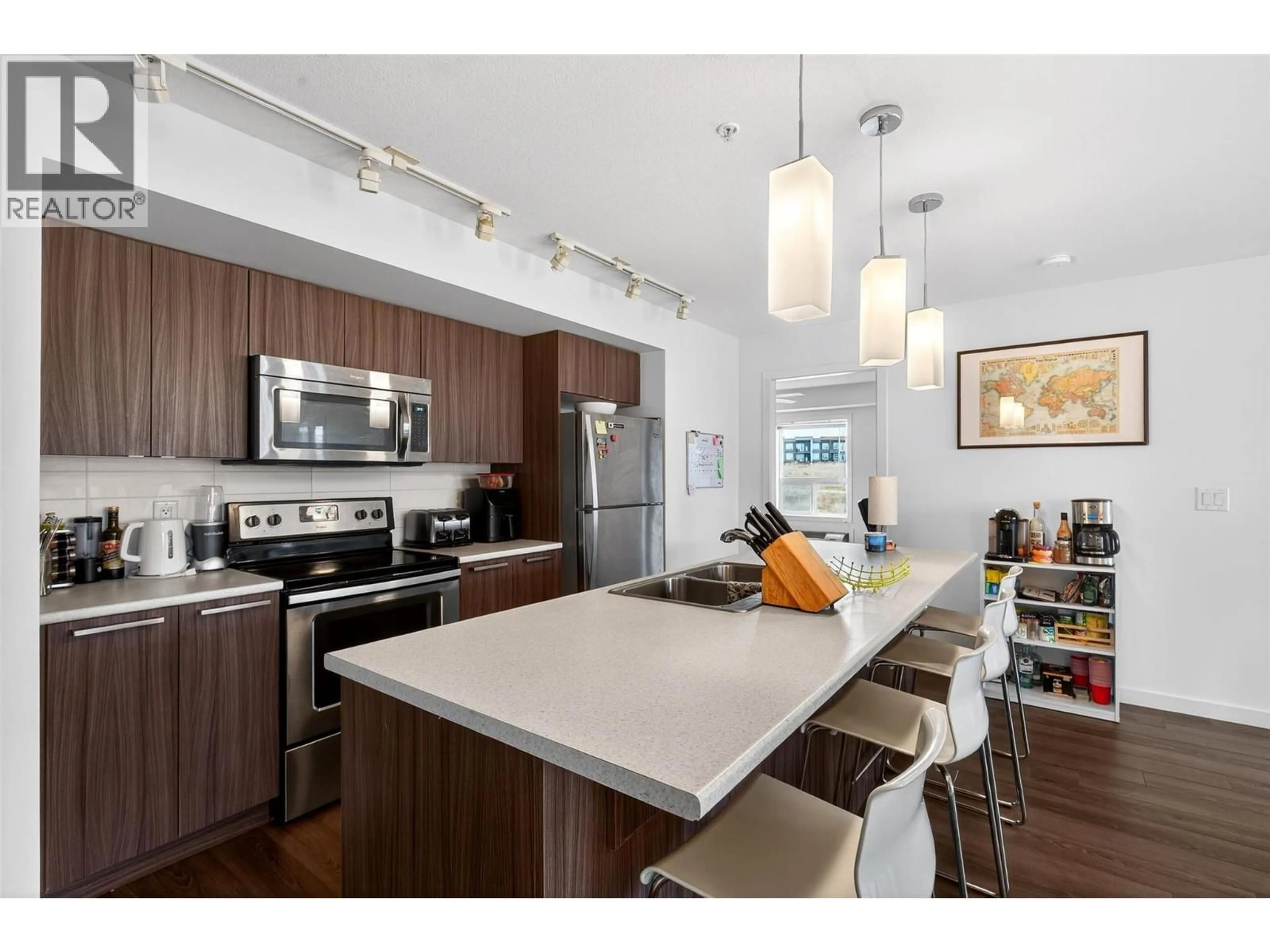 Open concept kitchen, unknown for 306 - 881 ACADEMY WAY, Kelowna British Columbia V1V0A2