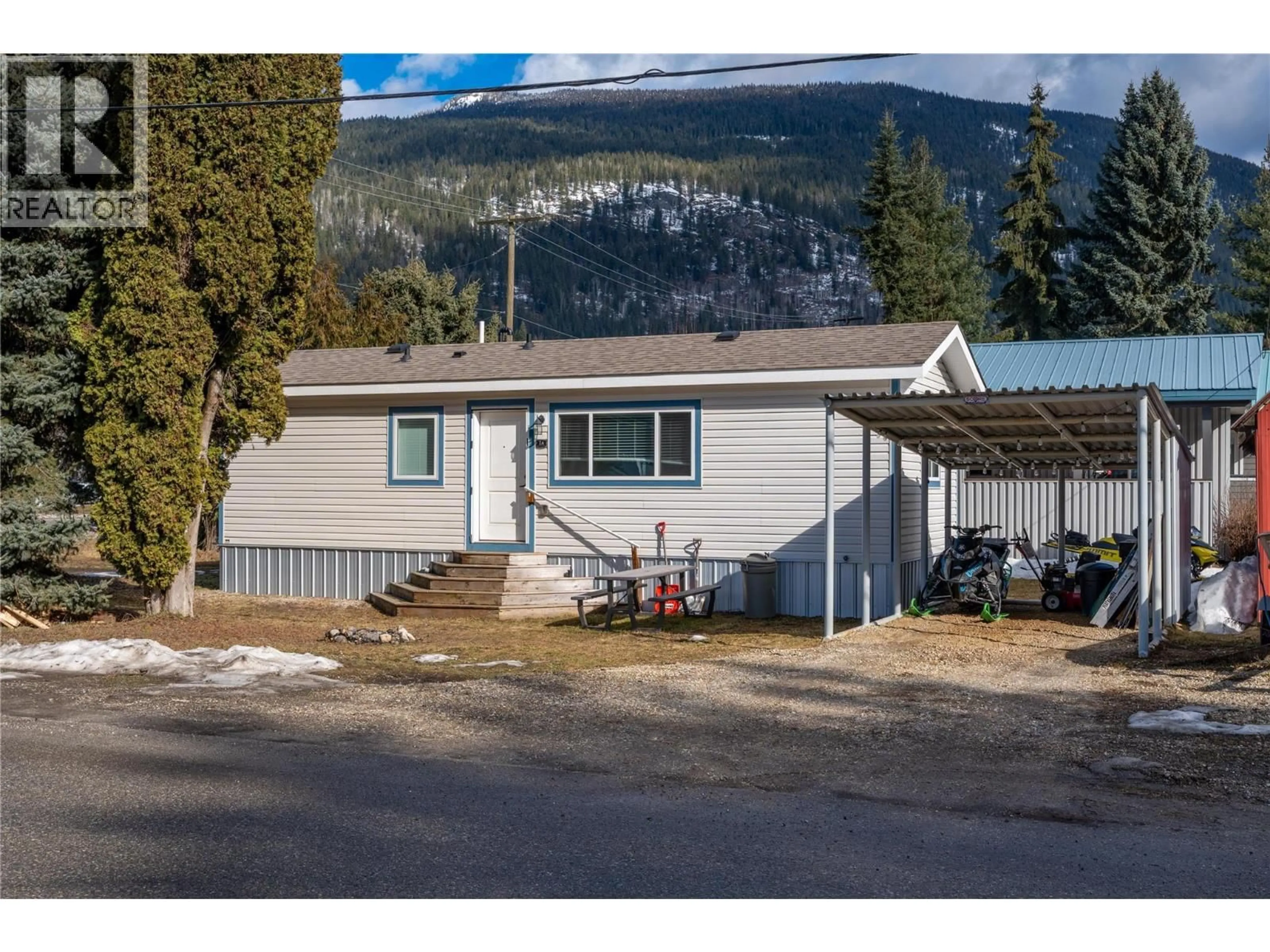 A pic from outside/outdoor area/front of a property/back of a property/a pic from drone, mountain view for 1A - 1204 MAPLEWOOD STREET, Revelstoke British Columbia V0E2S0
